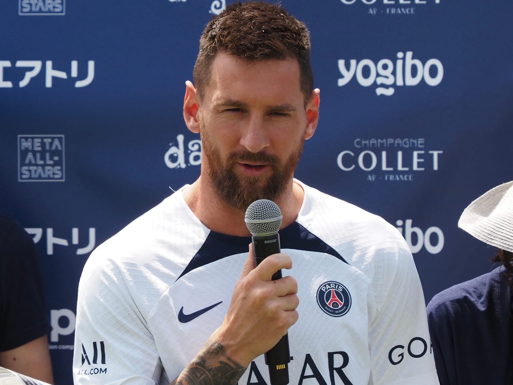 Frances football team Paris Saint-Germain player Lionel Messi answers a question while attending a soccer clinic at a stadium in Tokyo on July 18, 2022, as a part of the teams pre-season summer tour of Japan. (Photo by TOSHIFUMI KITAMURA and Toshifumi KITAMURA / AFP) (Photo by TOSHIFUMI KITAMURA/AFP via Getty Images)