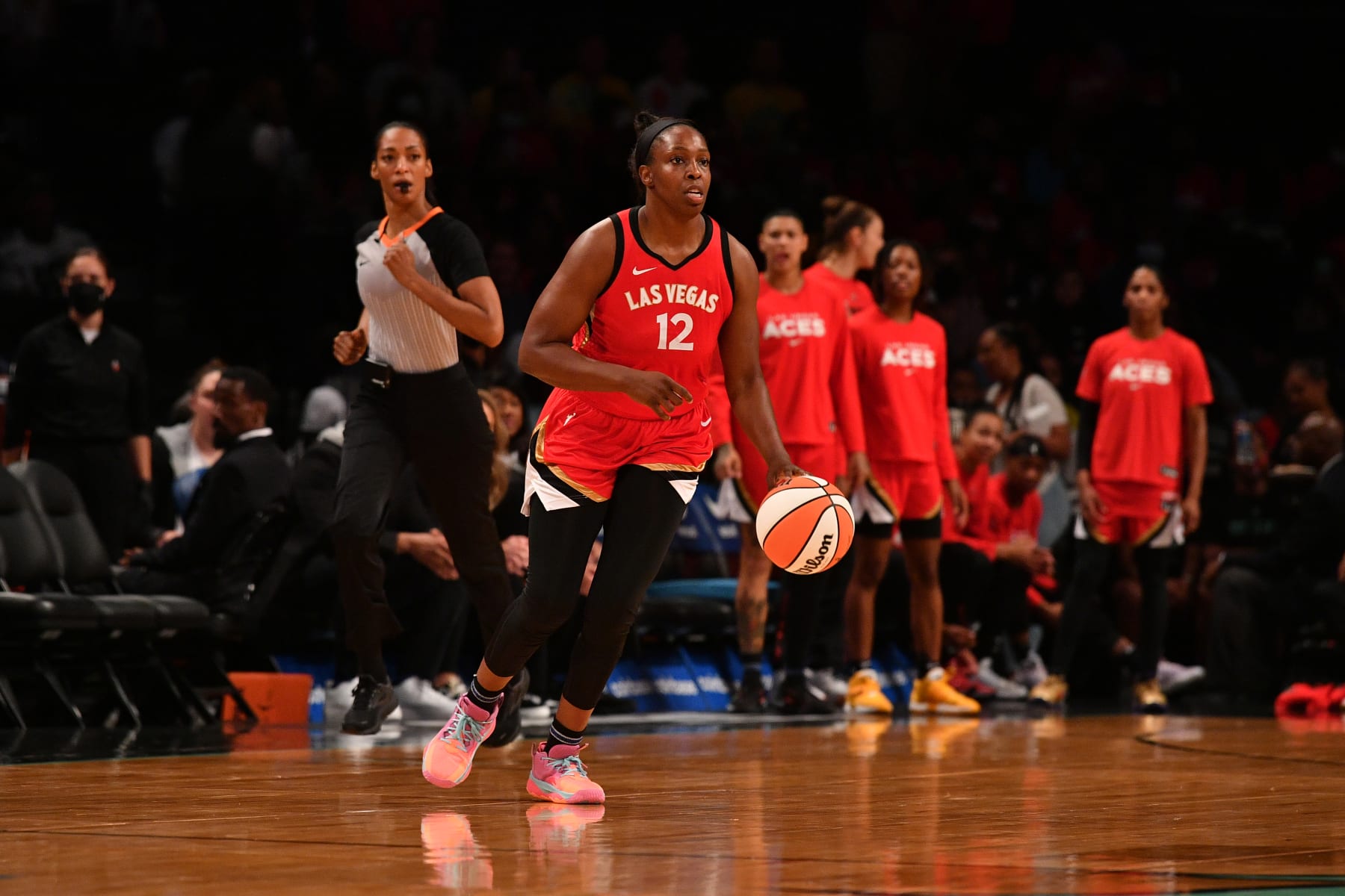BROOKLYN, NY - JULY 14:  Chelsea Gray #12 of the Las Vegas Aces dribbles the ball during the game against the New York Liberty on July 14, 2022 at the Barclays Center in Brooklyn, New York. NOTE TO USER: User expressly acknowledges and agrees that, by downloading and or using this photograph, user is consenting to the terms and conditions of the Getty Images License Agreement. Mandatory Copyright Notice: Copyright 2022 NBAE (Photo by Catalina Fragoso/NBAE via Getty Images)
