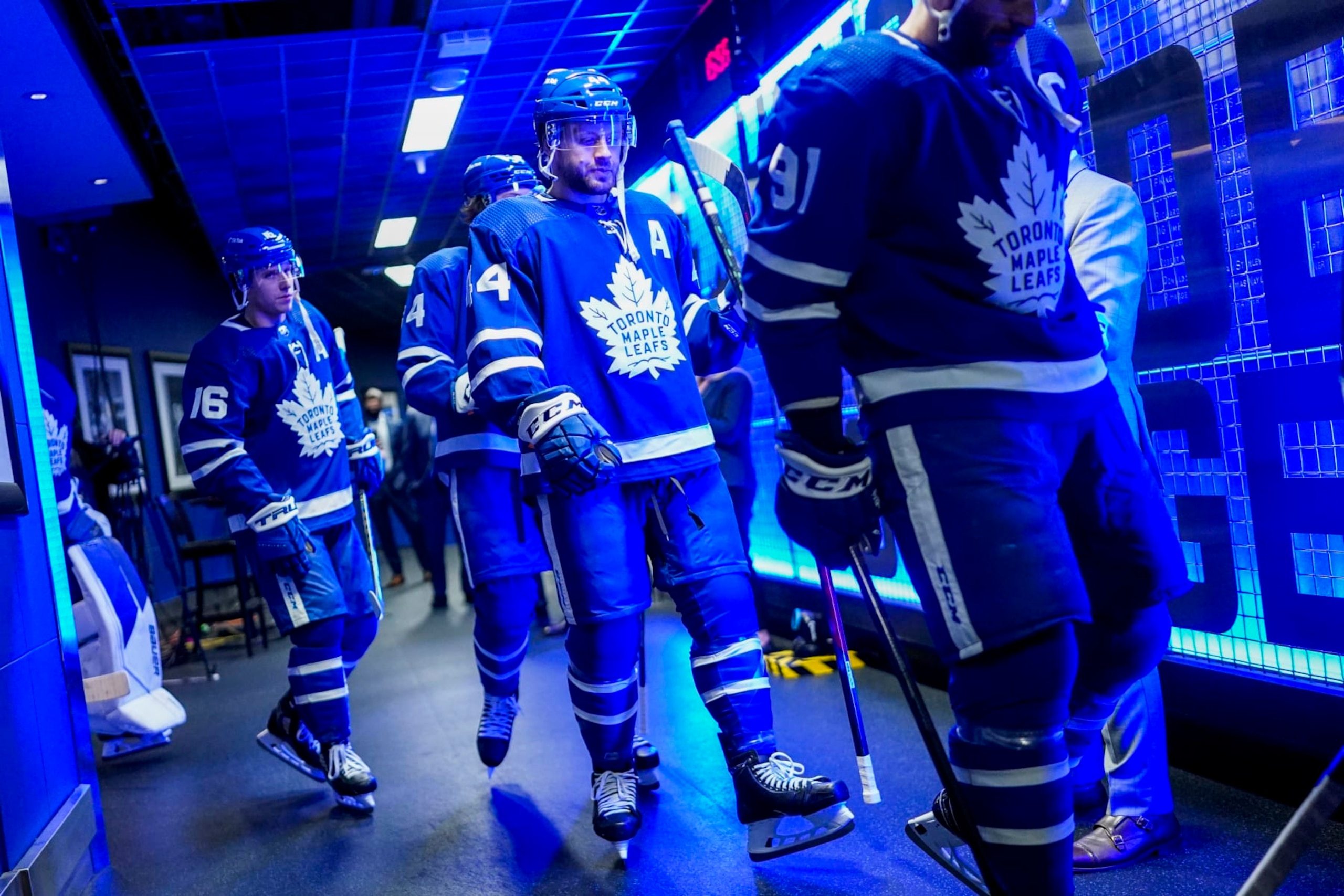 TORONTO, ON - MAY 14: Mitch Marner #16, Auston Matthews #34 and Morgan Rielly #44 of the Toronto Maple Leafs head to the ice before facing the Tampa Bay Lightning in Game Seven of the First Round of the 2022 Stanley Cup Playoffs at the Scotiabank Arena on May 14, 2022 in Toronto, Ontario, Canada. (Photo by Mark Blinch/NHLI via Getty Images)