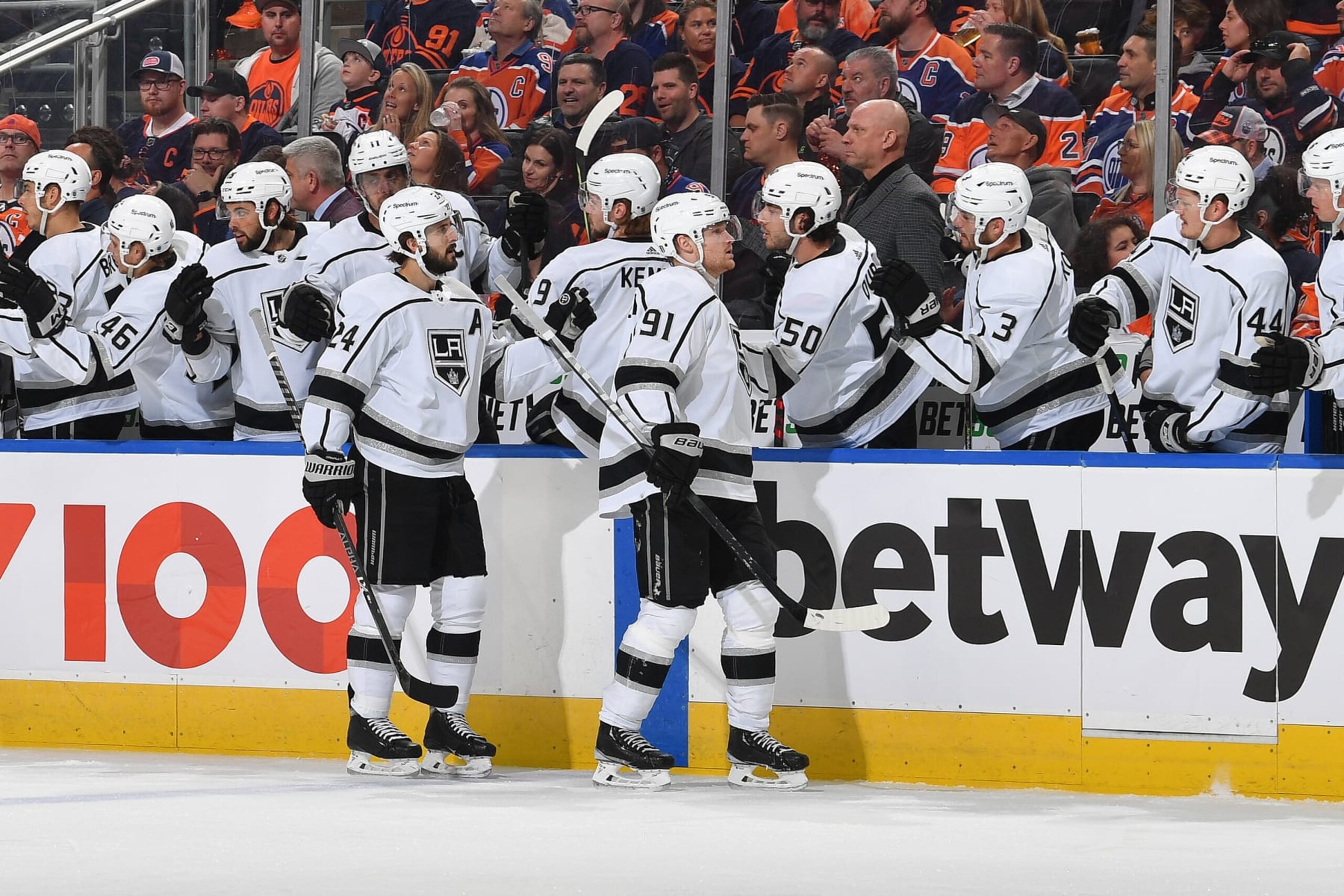 EDMONTON, AB - MAY 10: Phillip Danault #24 and Carl Grundstrom #91 of the Los Angeles Kings celebrate after a goal during Game Five of the First Round of the 2022 Stanley Cup Playoffs against the Edmonton Oilers on May 10, 2022 at Rogers Place in Edmonton, Alberta, Canada. (Photo by Andy Devlin/NHLI via Getty Images)