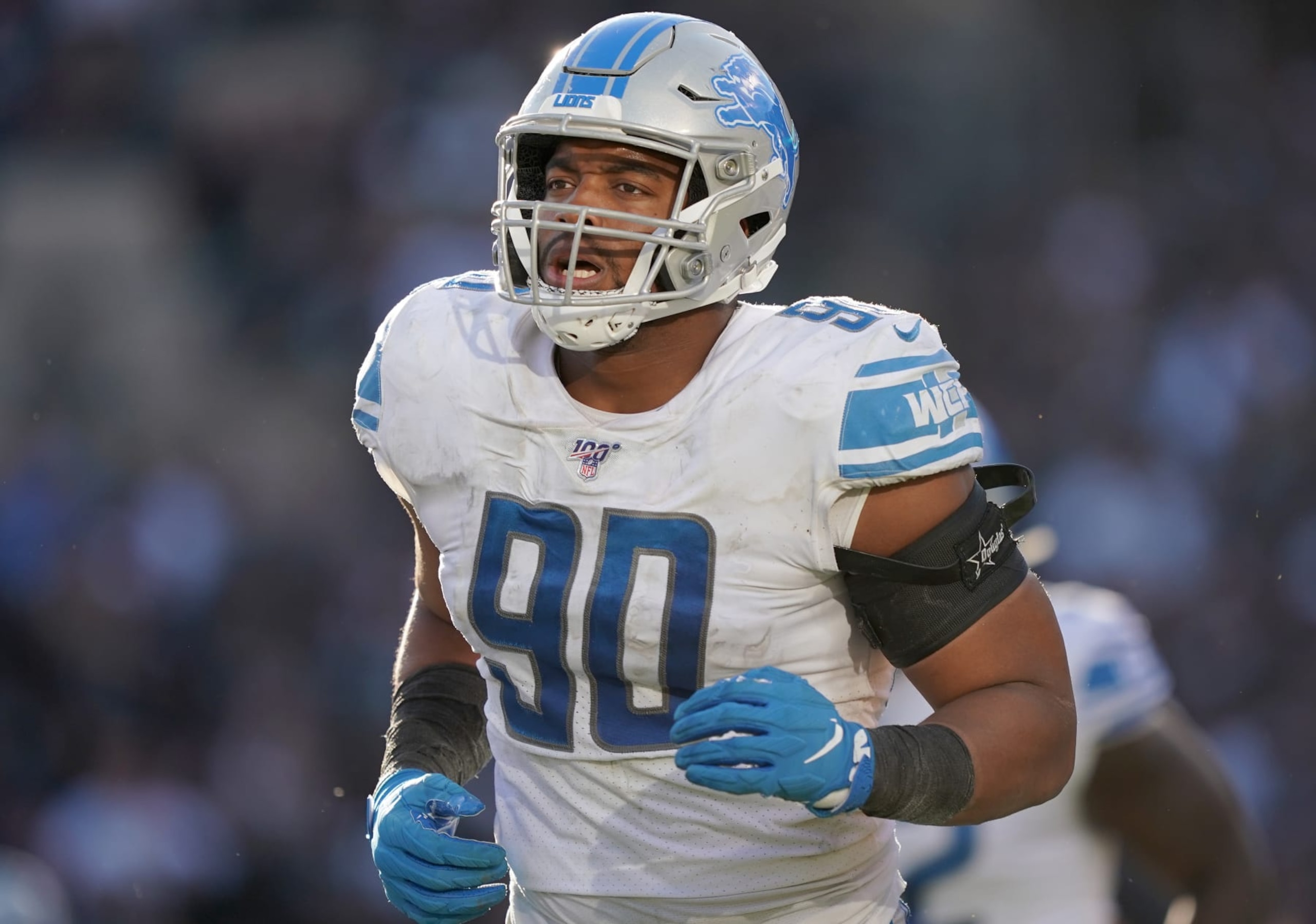 OAKLAND, CALIFORNIA - NOVEMBER 03: Trey Flowers #90 of the Detroit Lions runs off the field against the Oakland Raiders during the fourth quarter of an NFL football game at RingCentral Coliseum on November 03, 2019 in Oakland, California. (Photo by Thearon W. Henderson/Getty Images)
