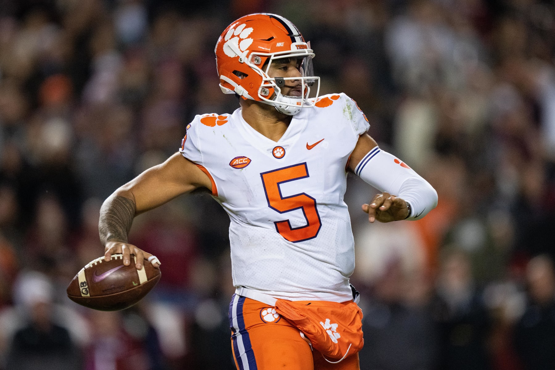 COLUMBIA, SOUTH CAROLINA - NOVEMBER 27: Quarterback D.J. Uiagalelei #5 of the Clemson Tigers looks to pass against the South Carolina Gamecocks during their game at Williams-Brice Stadium on November 27, 2021 in Columbia, South Carolina. (Photo by Jacob Kupferman/Getty Images)