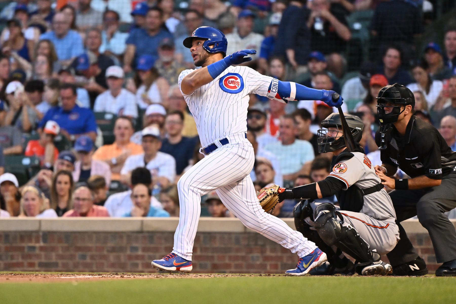 CHICAGO, IL - JULY 12:  Willson Contreras #40 of the Chicago Cubs bats against the Baltimore Orioles at Wrigley Field on July 12, 2022 in Chicago, Illinois.  (Photo by Jamie Sabau/Getty Images)