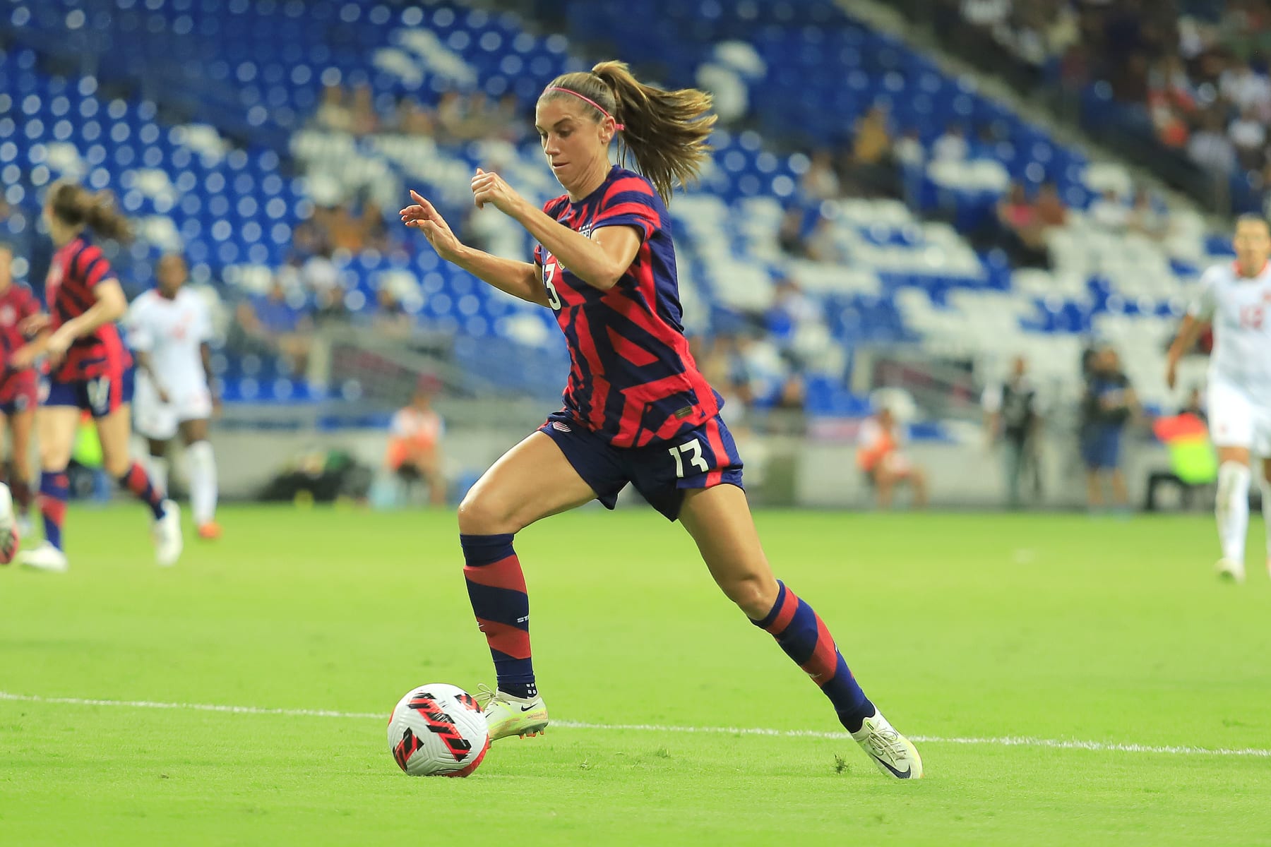 MONTERREY, MEXICO - JULY 18: Alex Morgan of United States controls the ball during the championship match between United States and Canada as part of the 2022 Concacaf W Championship at BBVA Stadium on July 18, 2022 in Monterrey, Mexico. (Photo by Jaime Lopez/Jam Media/Getty Images)