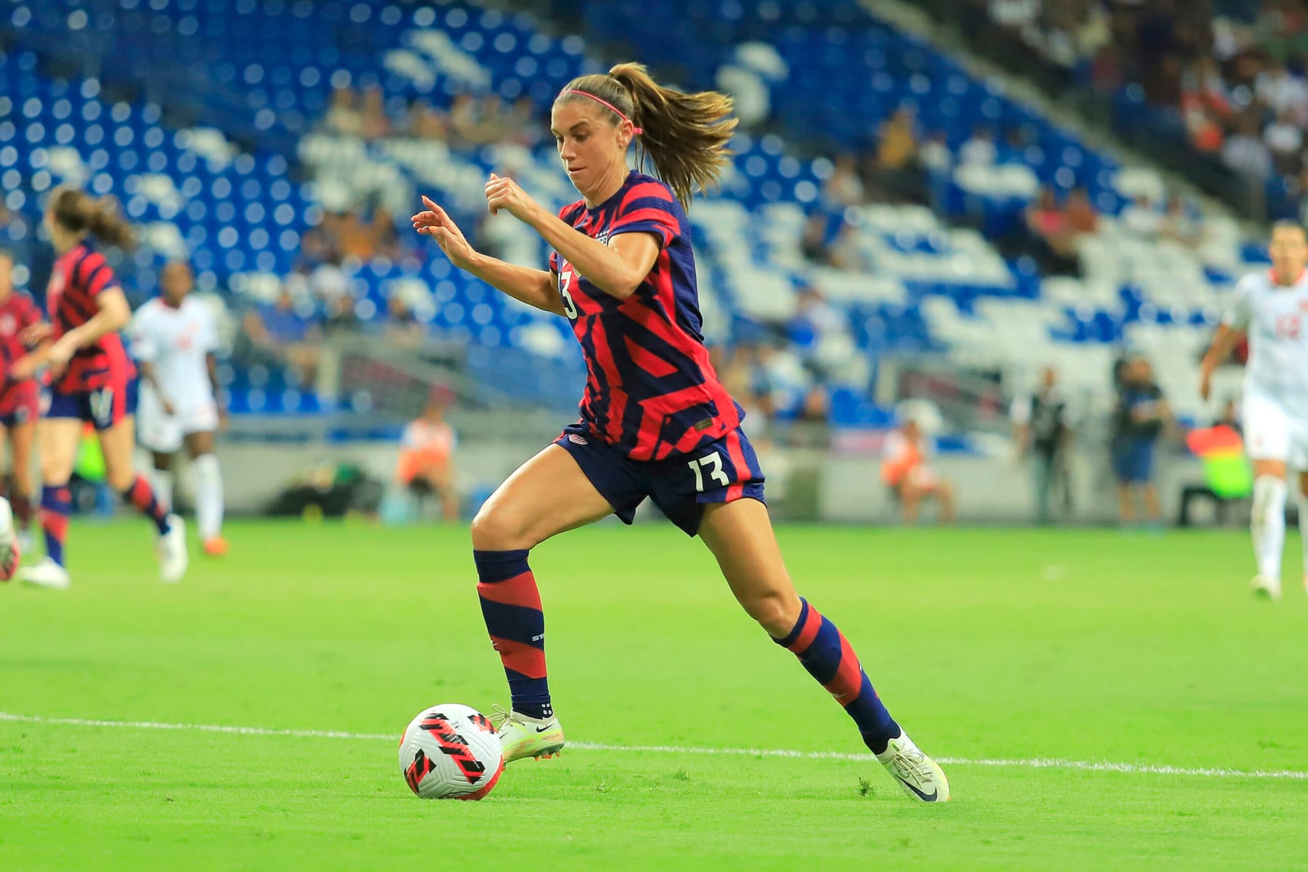 MONTERREY, MEXICO - JULY 18: Alex Morgan of United States controls the ball during the championship match between United States and Canada as part of the 2022 Concacaf W Championship at BBVA Stadium on July 18, 2022 in Monterrey, Mexico. (Photo by Jaime Lopez/Jam Media/Getty Images)