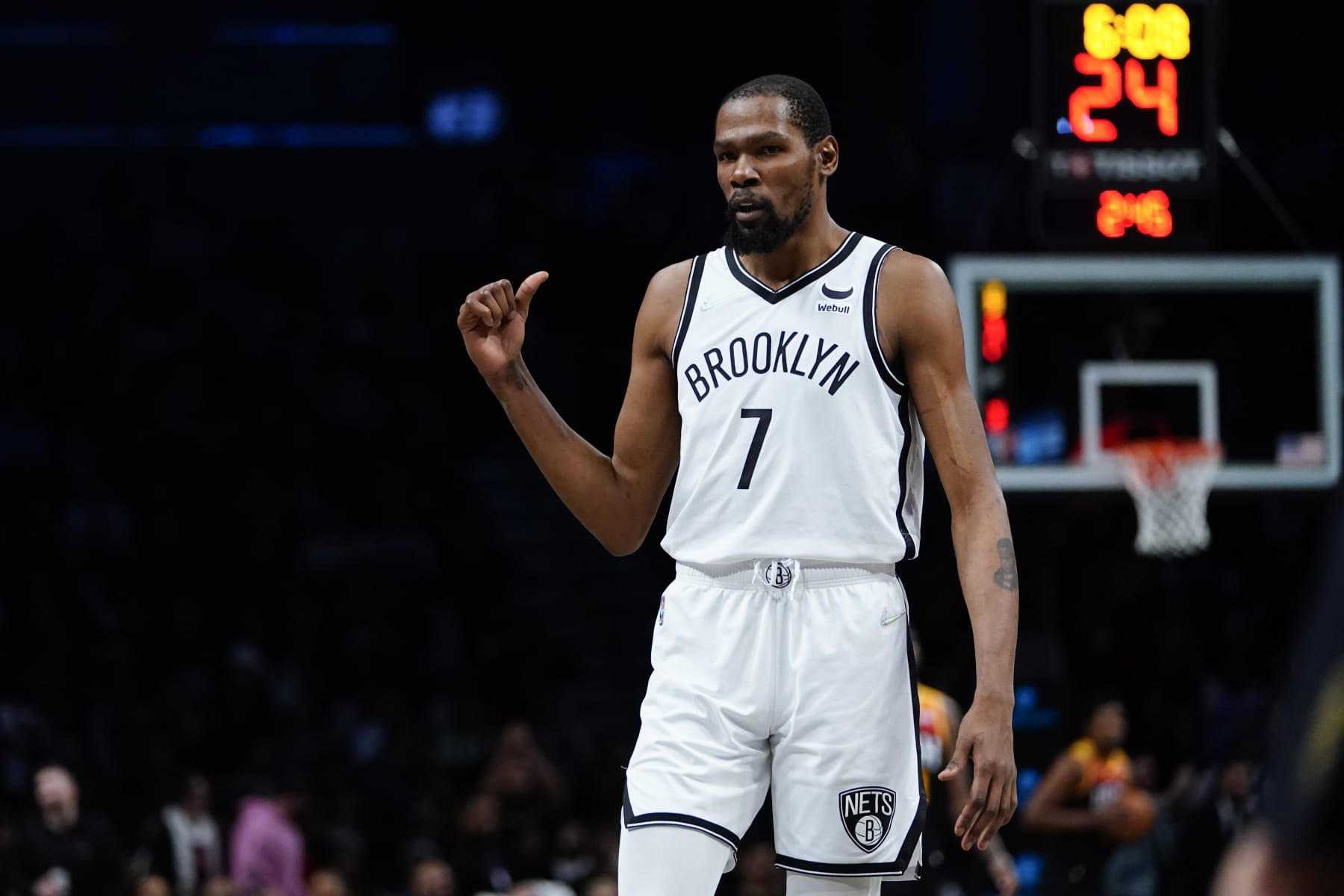 Brooklyn Nets' Kevin Durant (7) gestures as he talks to fans during the second half of an NBA basketball game against the Utah Jazz, Monday, March 21, 2022, in New York. (AP Photo/Frank Franklin II)