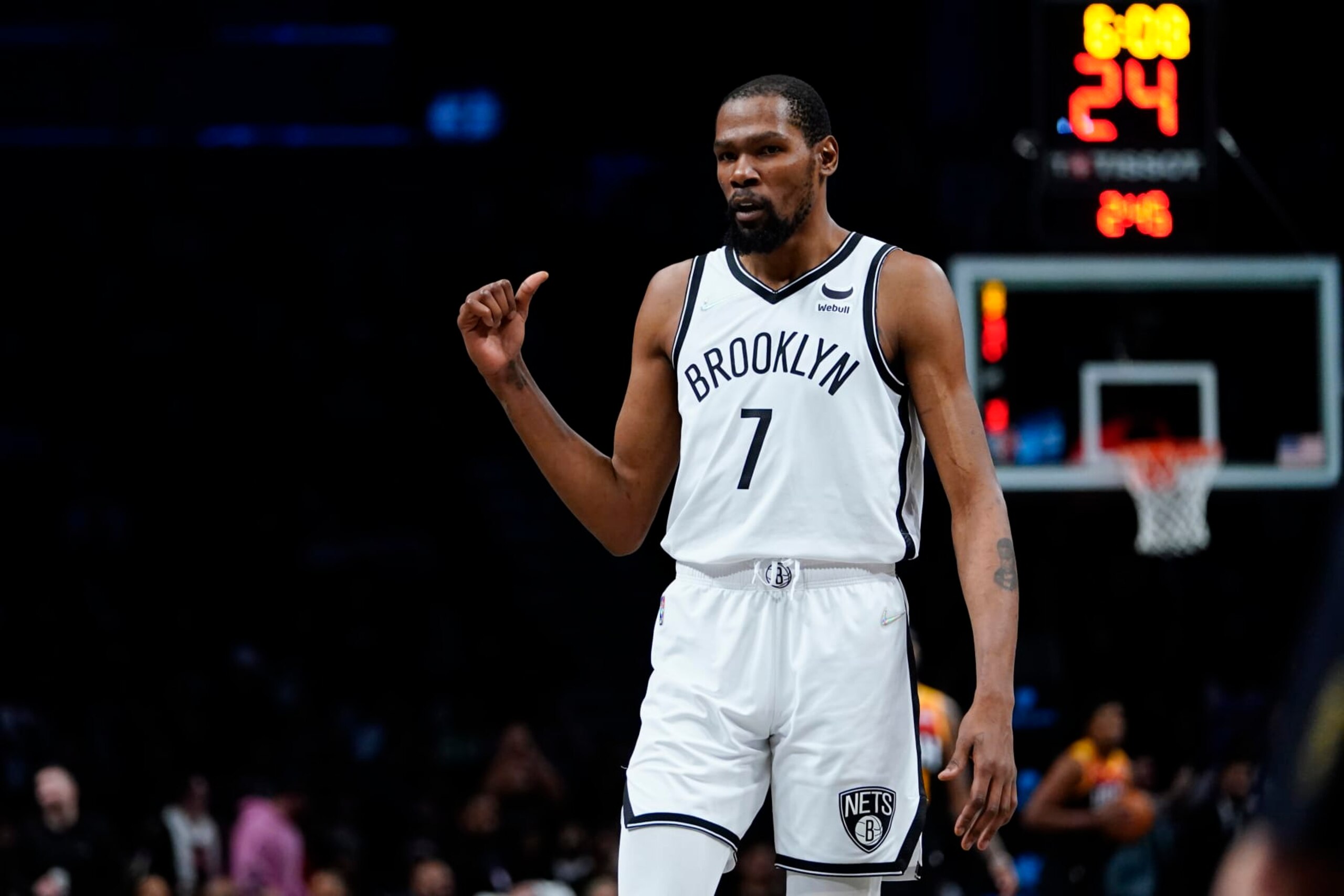 Brooklyn Nets' Kevin Durant (7) gestures as he talks to fans during the second half of an NBA basketball game against the Utah Jazz, Monday, March 21, 2022, in New York. (AP Photo/Frank Franklin II)