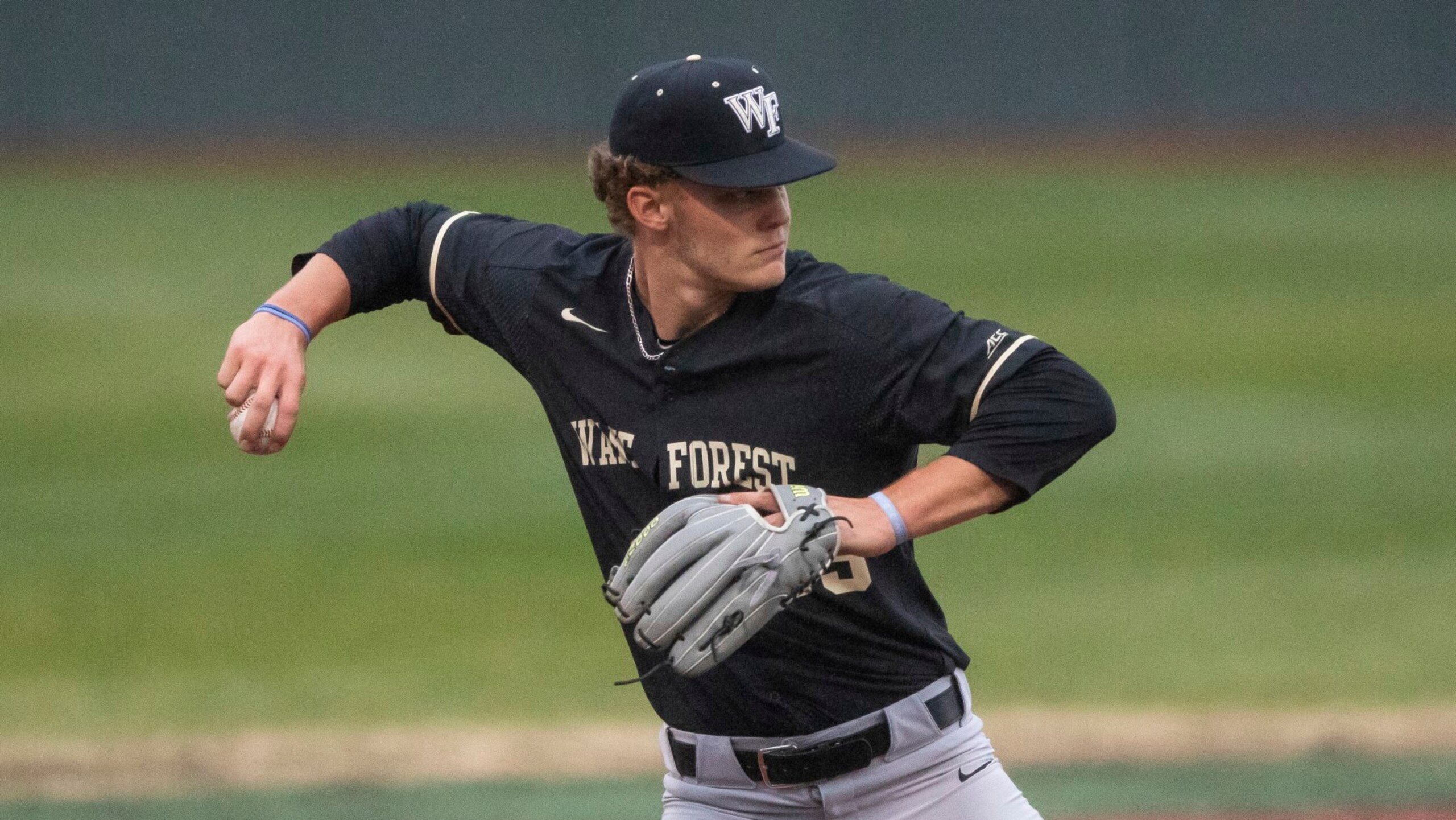 Wake Forest's Brock Wilken (25) makes a throw during an NCAA baseball game on Tuesday, March 23, 2021, in Elon, N.C. (AP Photo/Ben McKeown)