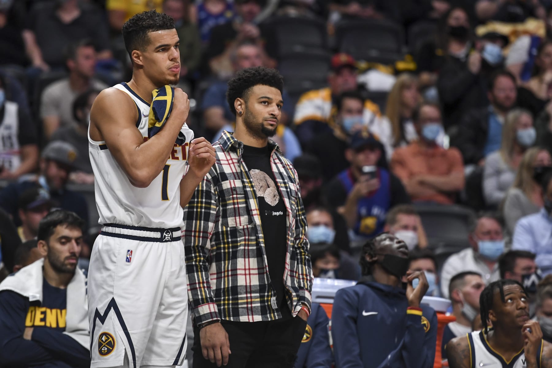 DENVER, CO - OCTOBER 25: Michael Porter Jr. (1) of the Denver Nuggets and Jamal Murray (27) watch the action against the Cleveland Cavaliers during the second quarter on Monday, October 25, 2021. (Photo by AAron Ontiveroz/MediaNews Group/The Denver Post via Getty Images)