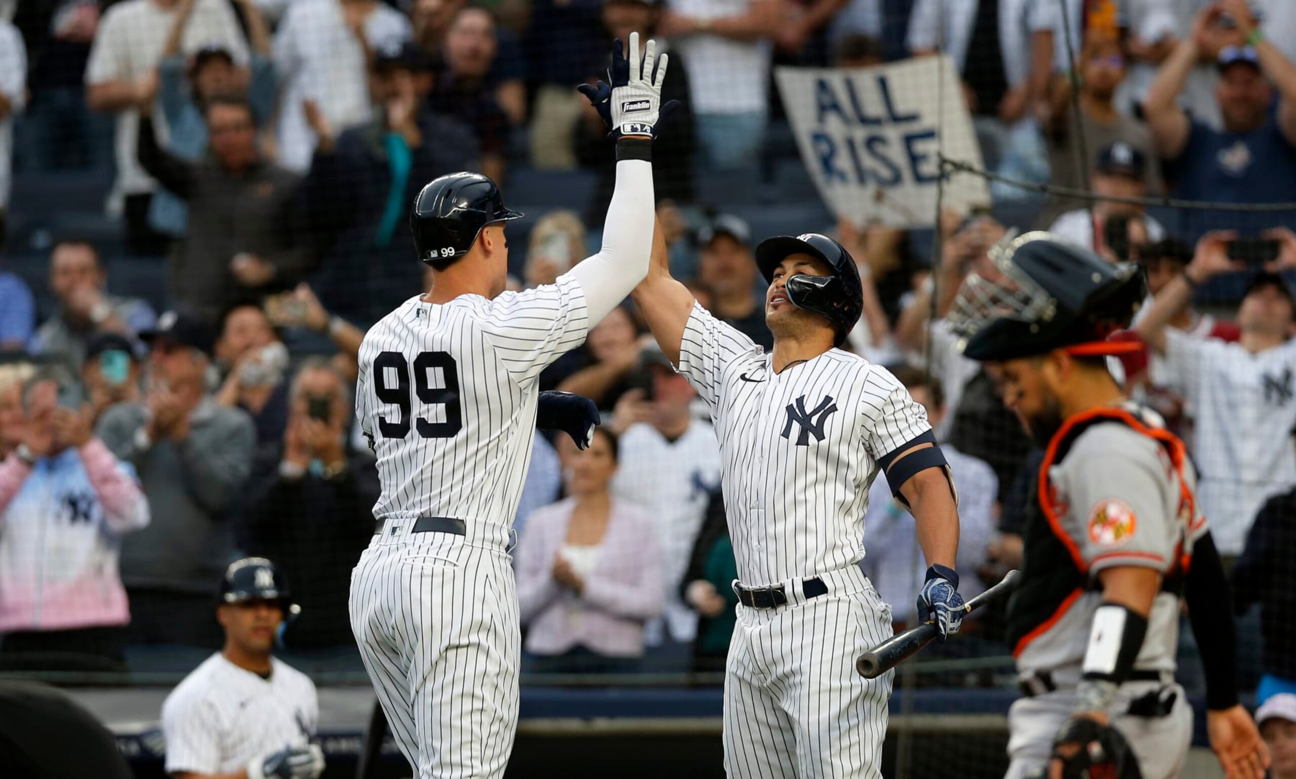 NEW YORK, NEW YORK - MAY 23:  Aaron Judge #99 of the New York Yankees celebrates his home run during the first inning against the Baltimore Orioles with teammate Giancarlo Stanton #27 at Yankee Stadium on May 23, 2022 in New York City. (Photo by Jim McIsaac/Getty Images)