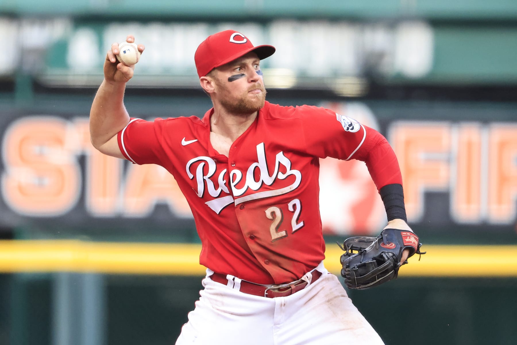 CINCINNATI, OHIO - JULY 02: Brandon Drury #22 of the Cincinnati Reds throws the ball to first base in the game against the Atlanta Braves at Great American Ball Park on July 02, 2022 in Cincinnati, Ohio. (Photo by Justin Casterline/Getty Images)