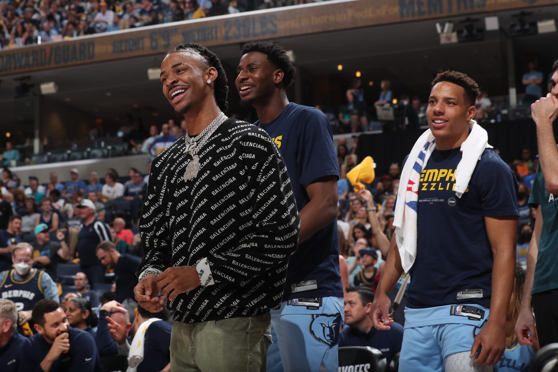 MEMPHIS, TN - MAY 11: Ja Morant #12, Jaren Jackson Jr. #13 and Desmond Bane #22 of the Memphis Grizzlies smile during Game 5 of the 2022 NBA Playoffs Western Conference Semifinals on May 11, 2022 at FedExForum in Memphis, Tennessee. NOTE TO USER: User expressly acknowledges and agrees that, by downloading and or using this photograph, User is consenting to the terms and conditions of the Getty Images License Agreement. Mandatory Copyright Notice: Copyright 2022 NBAE (Photo by Joe Murphy/NBAE via Getty Images)