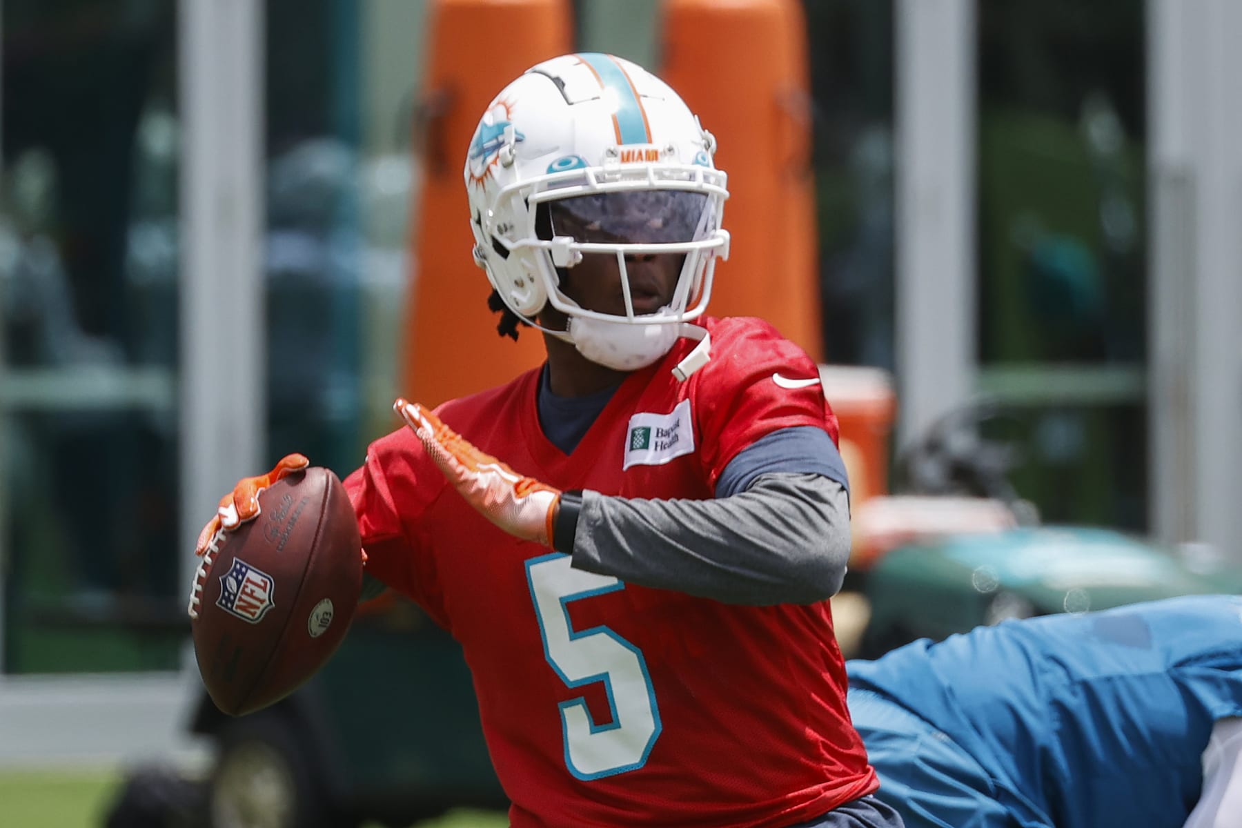 MIAMI GARDENS, FL - MAY 24: Teddy Bridgewater #5 of the Miami Dolphins throws the ball during the Miami Dolphins OTAs at the Baptist Health Training Complex on May 24, 2022 in Miami Gardens, Florida. (Photo by Joel Auerbach/Getty Images)