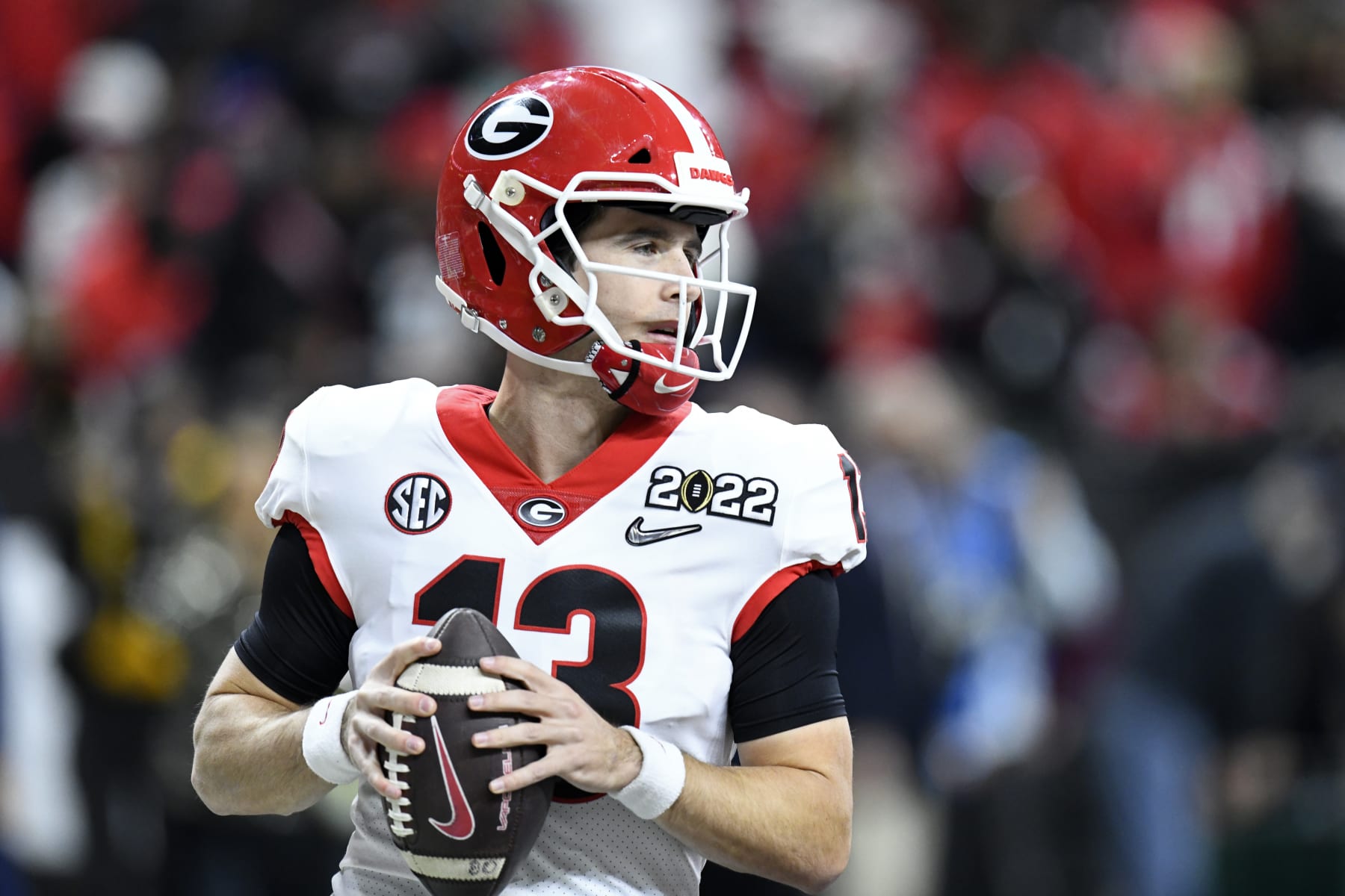 INDIANAPOLIS, IN - JANUARY 10: Georgia Bulldogs QB Stetson Bennett (13) warms up for the Alabama Crimson Tide versus the Georgia Bulldogs in the College Football Playoff National Championship, on January 10, 2022, at Lucas Oil Stadium in Indianapolis, IN. (Photo by Michael Allio/Icon Sportswire via Getty Images)
