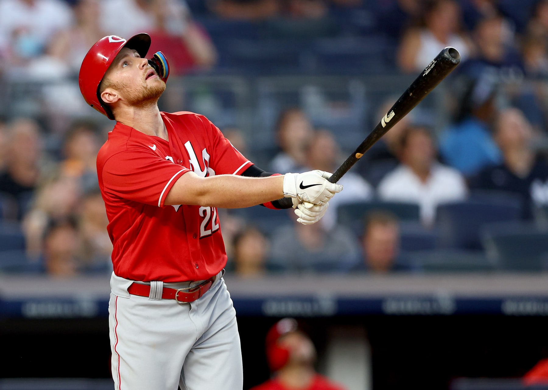 NEW YORK, NEW YORK - JULY 14:  Brandon Drury #22 of the Cincinnati Reds hits a sacrifice fly as Nick Senzel #15 of the Reds scores in the fifth inning against the New York Yankees at Yankee Stadium on July 14, 2022 in the Bronx borough of New York City. (Photo by Elsa/Getty Images)