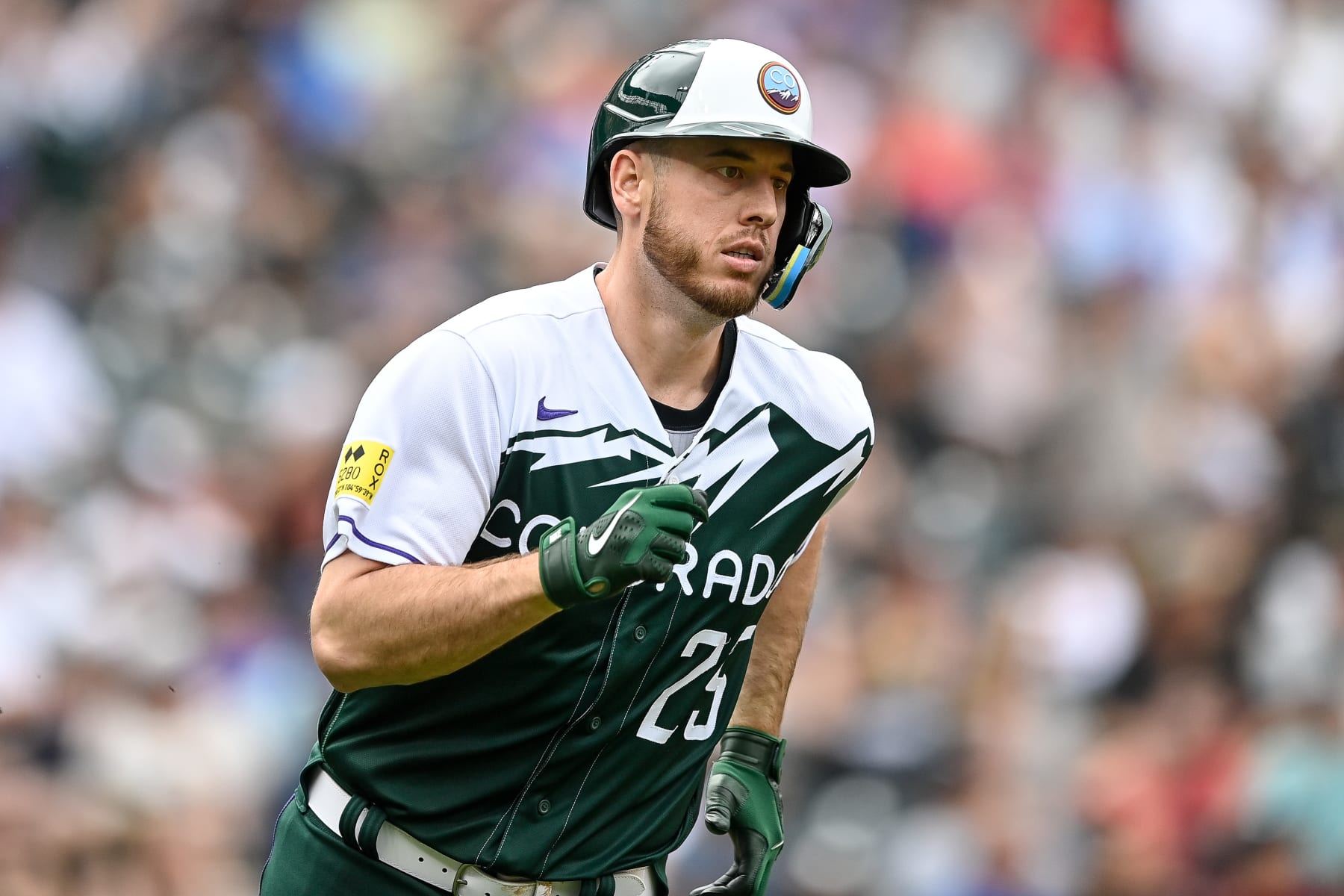 DENVER, CO - JULY 3: C.J. Cron #25 of the Colorado Rockies runs after hitting a sixth innign three-run home run against the Arizona Diamondbacks at Coors Field on July 3, 2022 in Denver, Colorado. (Photo by Dustin Bradford/Getty Images)