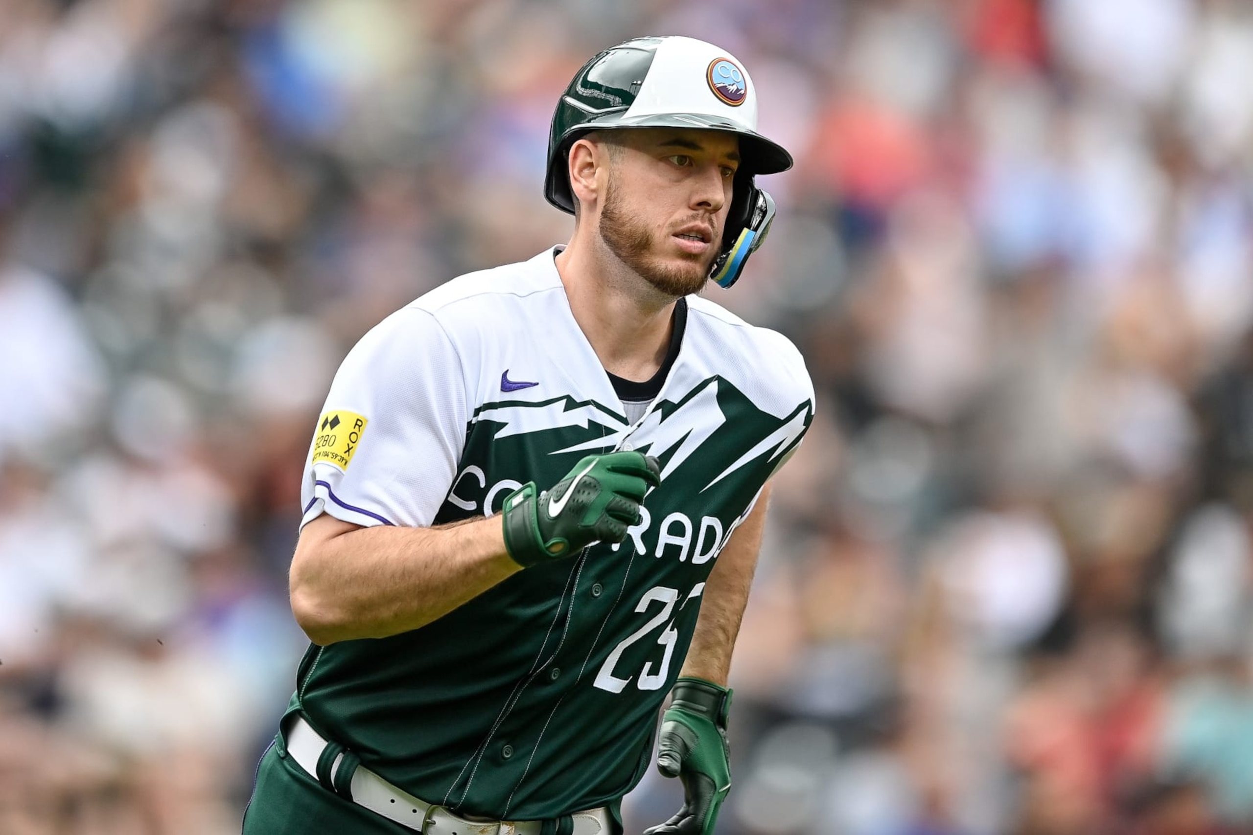 DENVER, CO - JULY 3: C.J. Cron #25 of the Colorado Rockies runs after hitting a sixth innign three-run home run against the Arizona Diamondbacks at Coors Field on July 3, 2022 in Denver, Colorado. (Photo by Dustin Bradford/Getty Images)