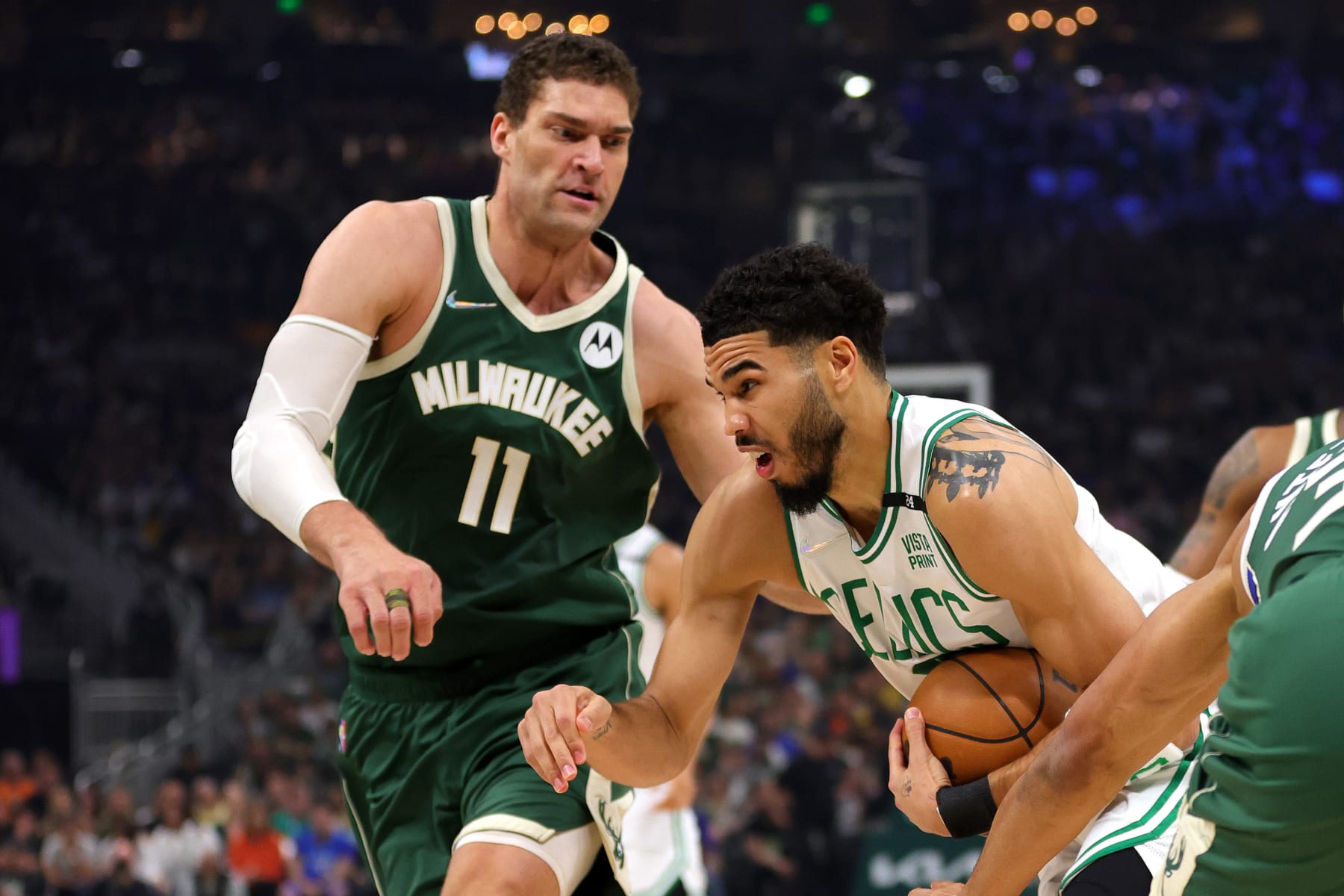 MILWAUKEE, WISCONSIN - MAY 13: Jayson Tatum #0 of the Boston Celtics drives to the basket against Brook Lopez #11 of the Milwaukee Bucks during the first quarter in Game Six of the 2022 NBA Playoffs Eastern Conference Semifinals at Fiserv Forum on May 13, 2022 in Milwaukee, Wisconsin. NOTE TO USER: User expressly acknowledges and agrees that, by downloading and/or using this photograph, User is consenting to the terms and conditions of the Getty Images License Agreement. (Photo by Stacy Revere/Getty Images)