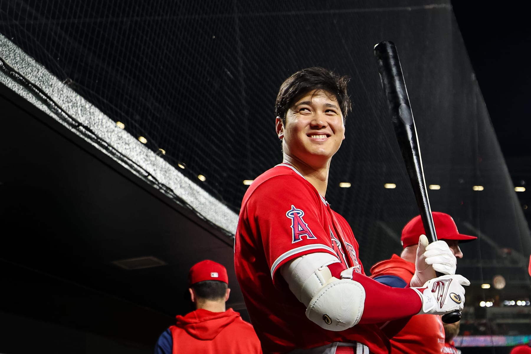 BALTIMORE, MD - JULY 08: Shohei Ohtani #17 of the Los Angeles Angels interacts with fans from the dugout during the seventh inning of the game against the Baltimore Orioles at Oriole Park at Camden Yards on July 8, 2022 in Baltimore, Maryland. (Photo by Scott Taetsch/Getty Images)