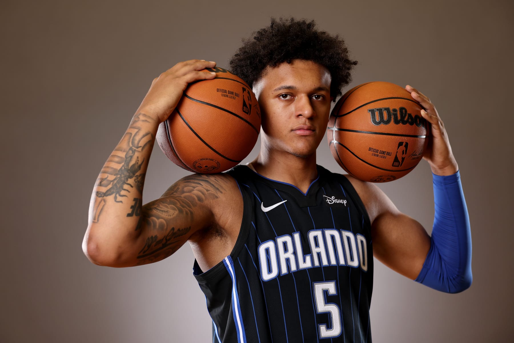 LAS VEGAS, NEVADA - JULY 15: Paolo Banchero #5 of the Orlando Magic poses during the 2022 NBA Rookie Portraits at UNLV on July 15, 2022 in Las Vegas, Nevada. NOTE TO USER: User expressly acknowledges and agrees that, by downloading and/or using this photograph, User is consenting to the terms and conditions of the Getty Images License Agreement. (Photo by Gregory Shamus/Getty Images)