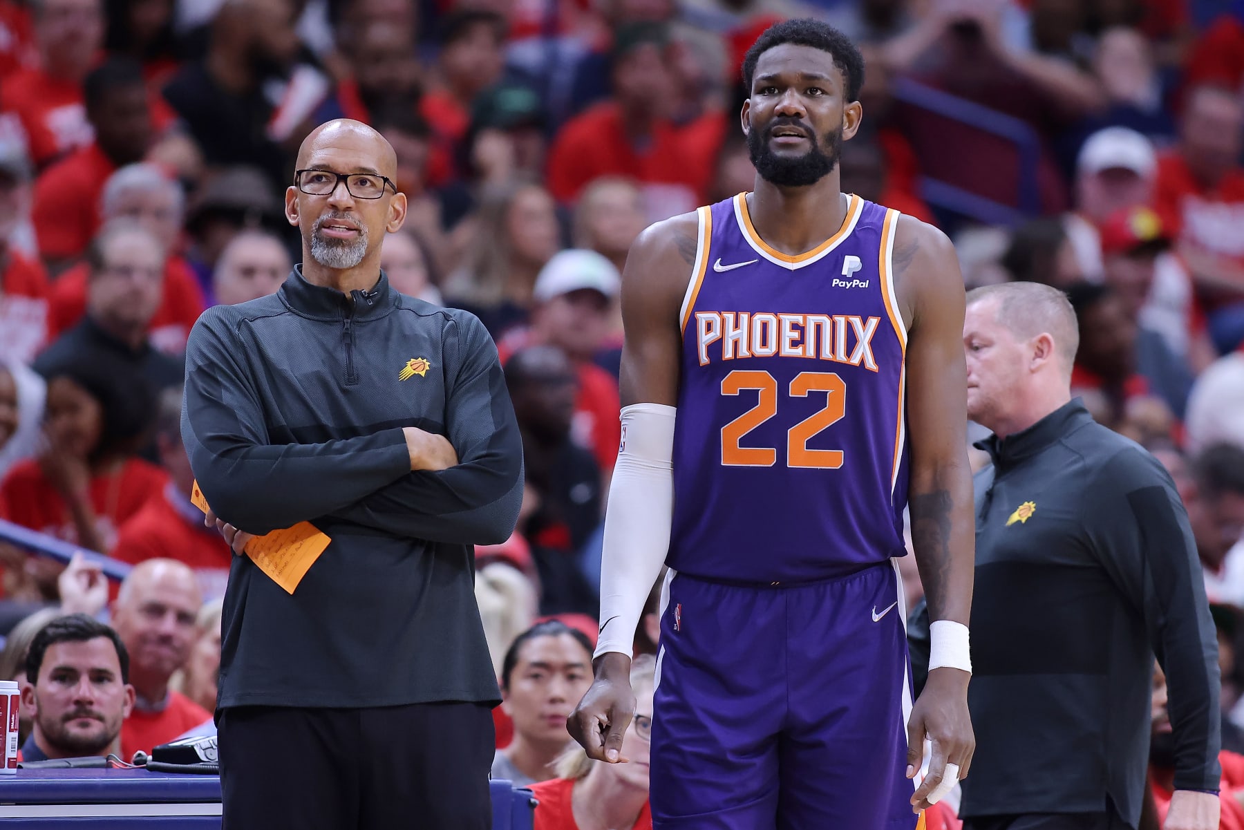 NEW ORLEANS, LOUISIANA - APRIL 24: Deandre Ayton #22 and Head coach Monty Williams of the Phoenix Suns react during Game Four of the Western Conference First Round NBA Playoffs against the New Orleans Pelicans at the Smoothie King Center on April 24, 2022 in New Orleans, Louisiana. NOTE TO USER: User expressly acknowledges and agrees that, by downloading and or using this Photograph, user is consenting to the terms and conditions of the Getty Images License Agreement. (Photo by Jonathan Bachman/Getty Images)