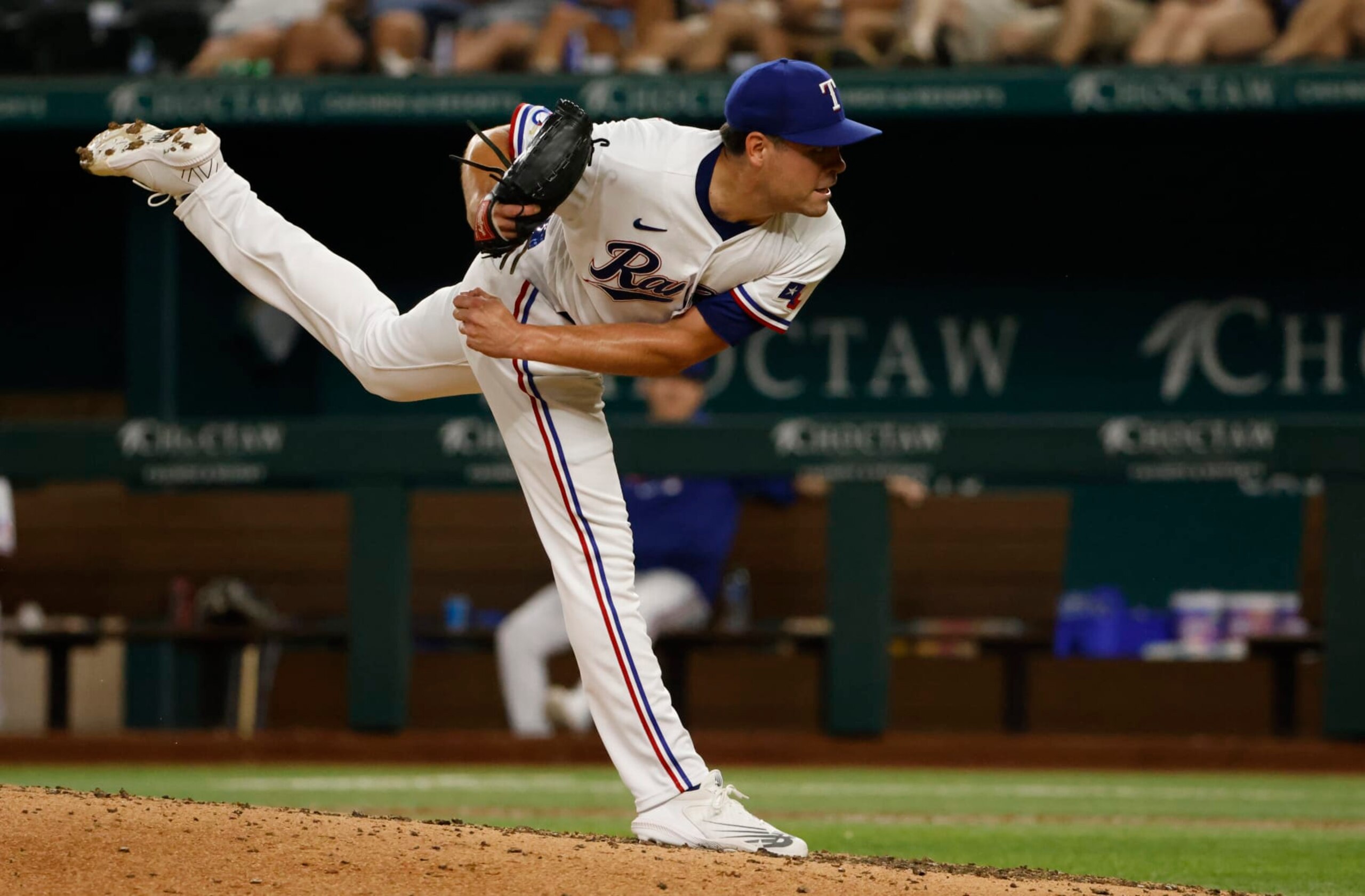 ARLINGTON, TX - JULY 12: Matt Moore #45 of the Texas Rangers delivers against the Oakland Athletics at Globe Life Field on July 12, 2022 in Arlington, Texas.  (Photo by Ron Jenkins/Getty Images)