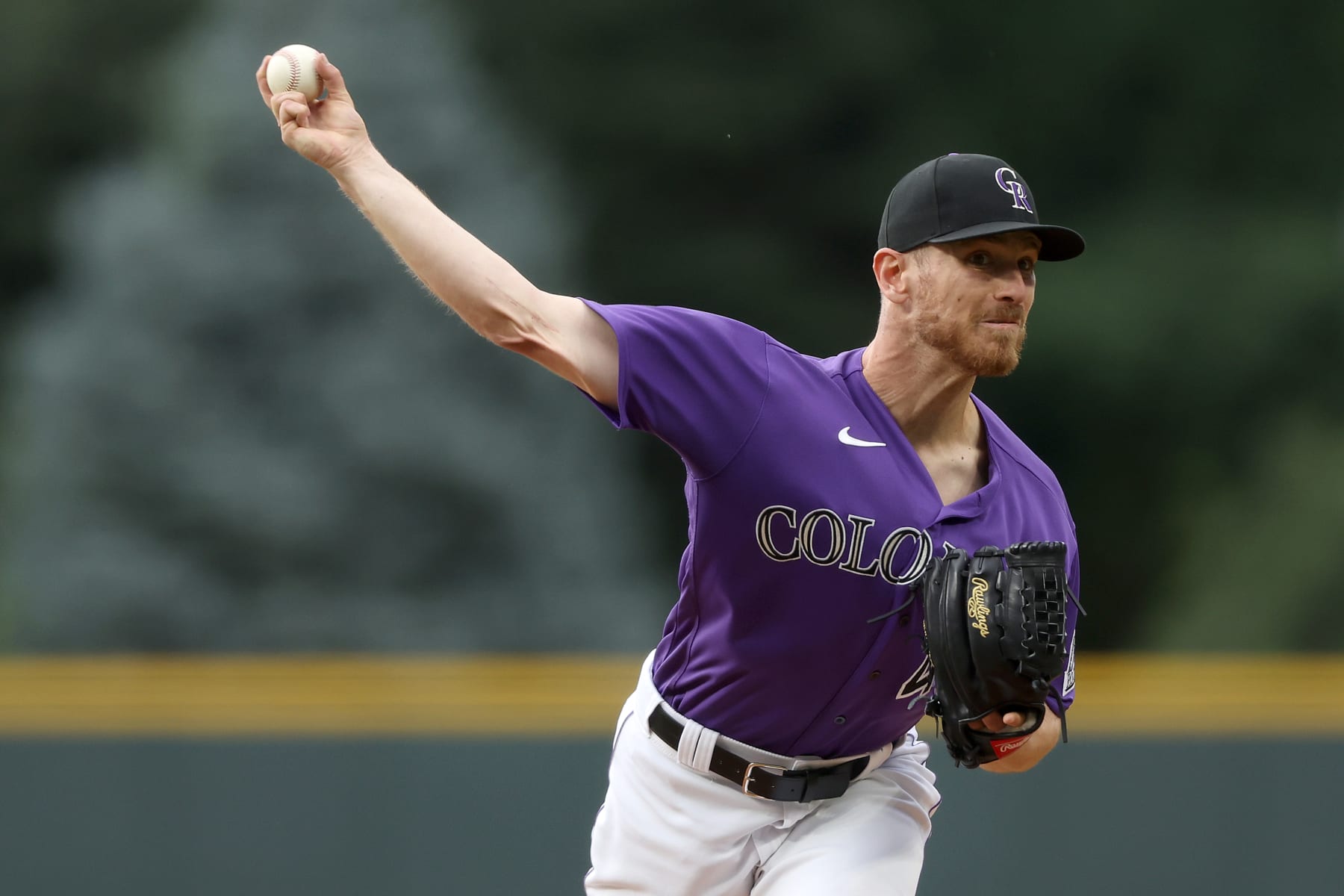 DENVER, COLORADO - JULY 13: Starting pitcher Chad Kuhl #41 of the Colorado Rockies throws against the San Diego Padres in the first inning at Coors Field on July 13, 2022 in Denver, Colorado. (Photo by Matthew Stockman/Getty Images)