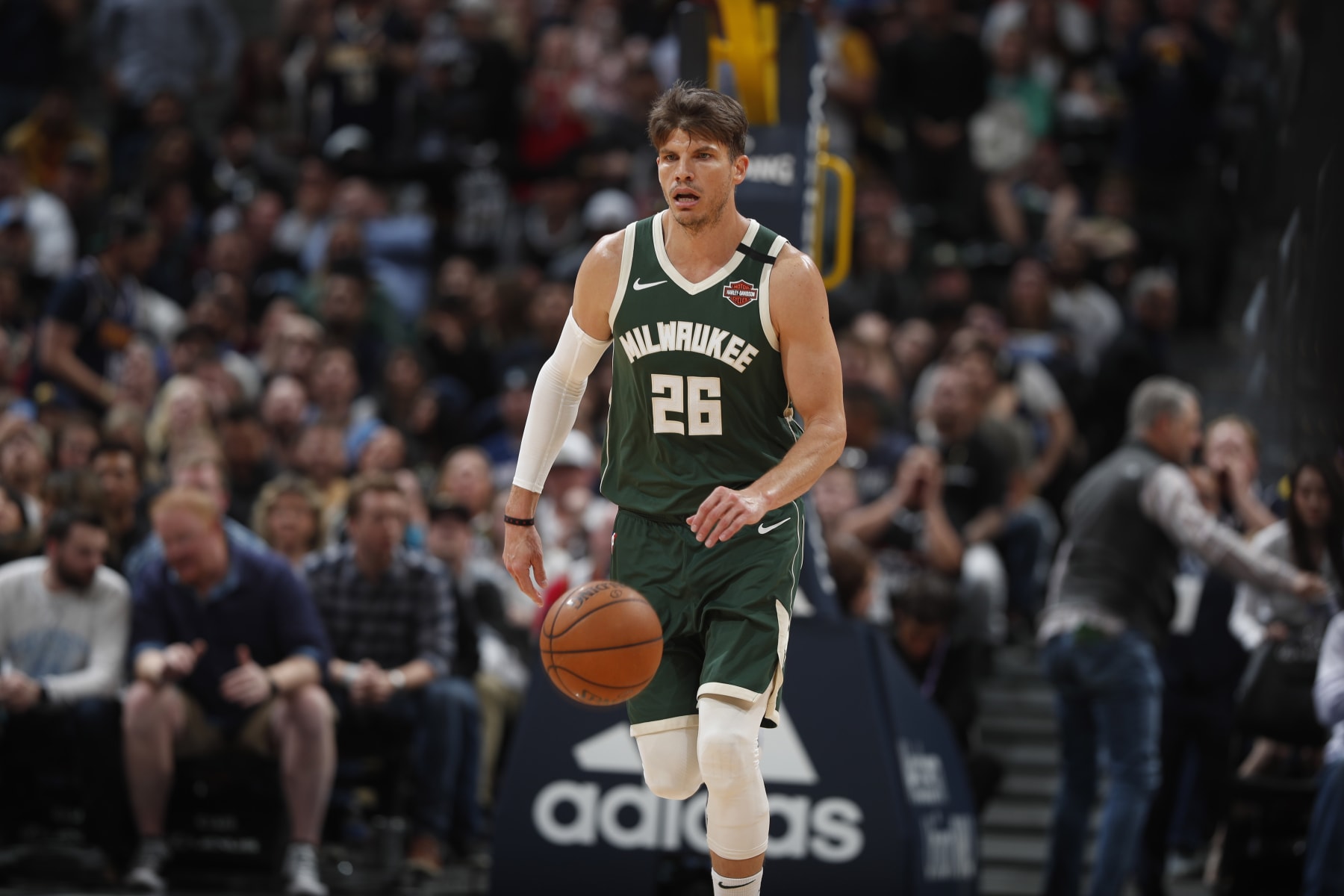 Milwaukee Bucks guard Kyle Korver (26) in the second half of an NBA basketball game Monday, March 9, 2020, in Denver. The Nuggets won 109-95. (AP Photo/David Zalubowski)
