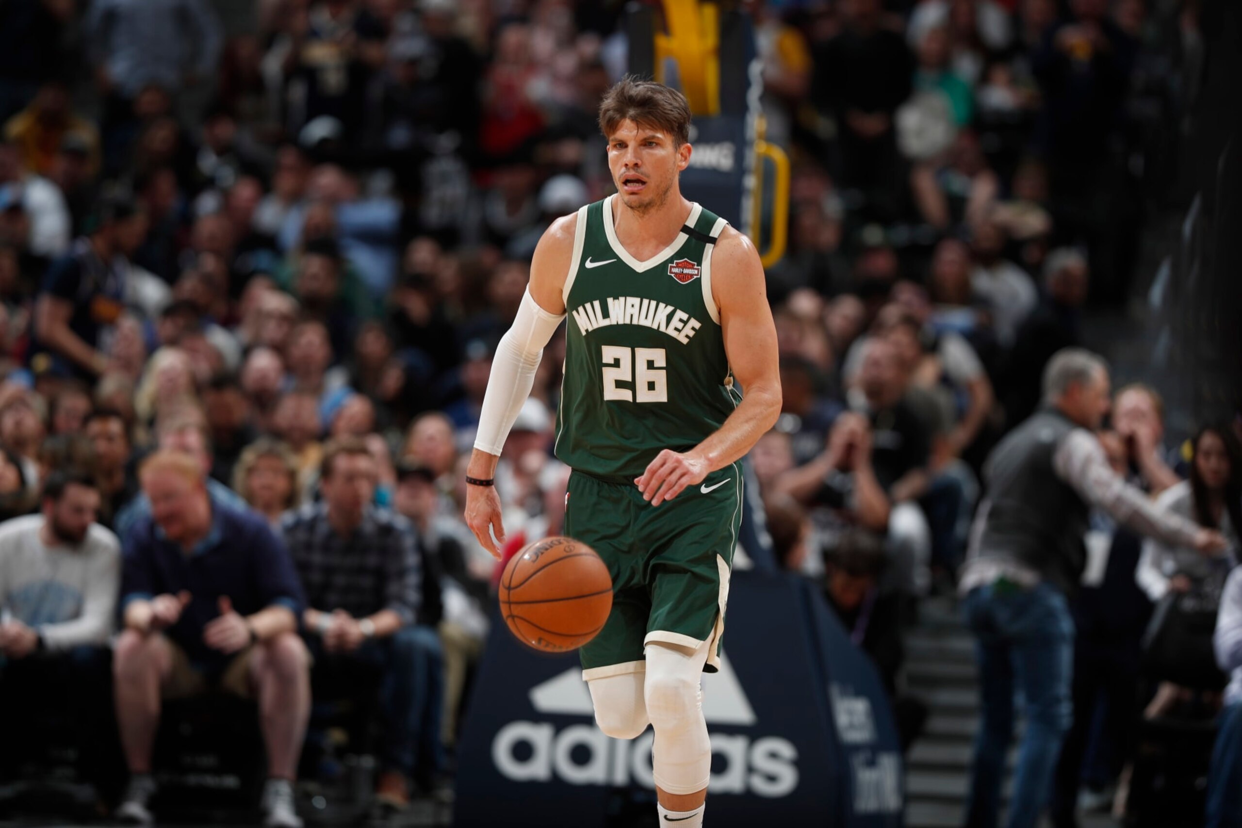 Milwaukee Bucks guard Kyle Korver (26) in the second half of an NBA basketball game Monday, March 9, 2020, in Denver. The Nuggets won 109-95. (AP Photo/David Zalubowski)