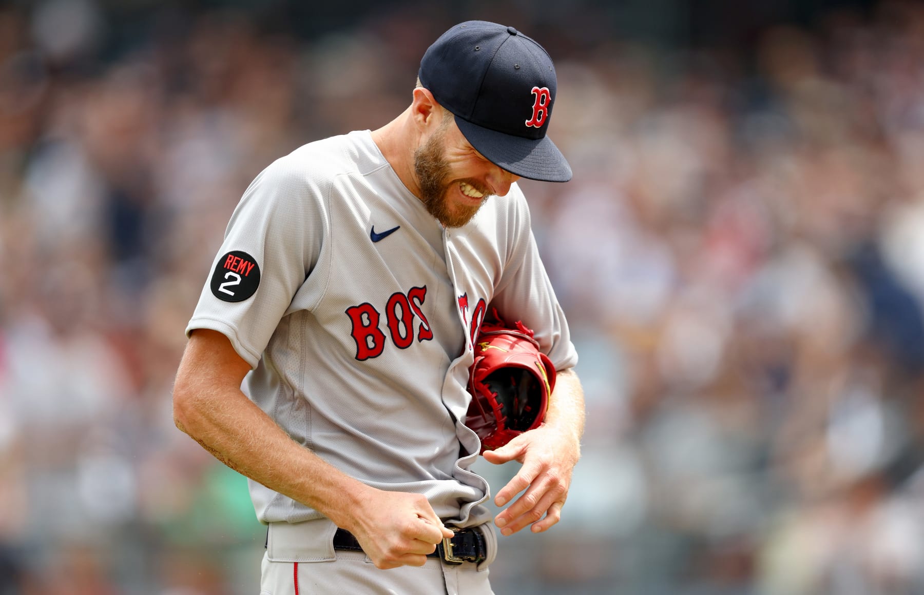NEW YORK, NEW YORK - JULY 17:  Chris Sale #41 of the Boston Red Sox leaves the field with a dislocated pinky finger after getting hit by a line drive from Aaron Hicks of the New York Yankees in the first inning at Yankee Stadium on July 17, 2022 in the Bronx borough of New York City. (Photo by Elsa/Getty Images)