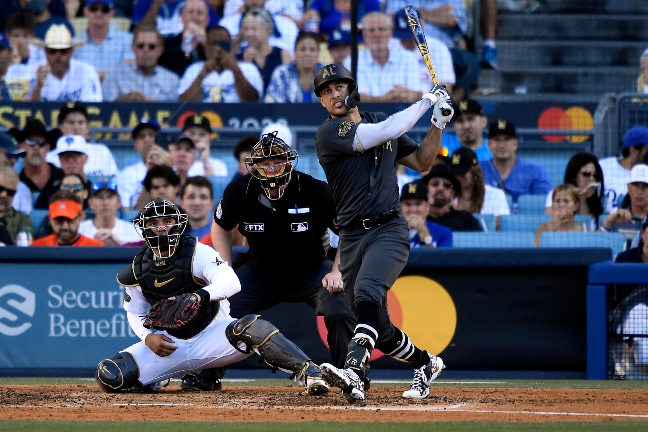 LOS ANGELES, CALIFORNIA - JULY 19: Giancarlo Stanton #27 of the New York Yankees follows the ball after hitting a two RBI home run against the National League in the fourth inning during the 92nd MLB All-Star Game presented by Mastercard at Dodger Stadium on July 19, 2022 in Los Angeles, California. (Photo by Kevork Djansezian/Getty Images)