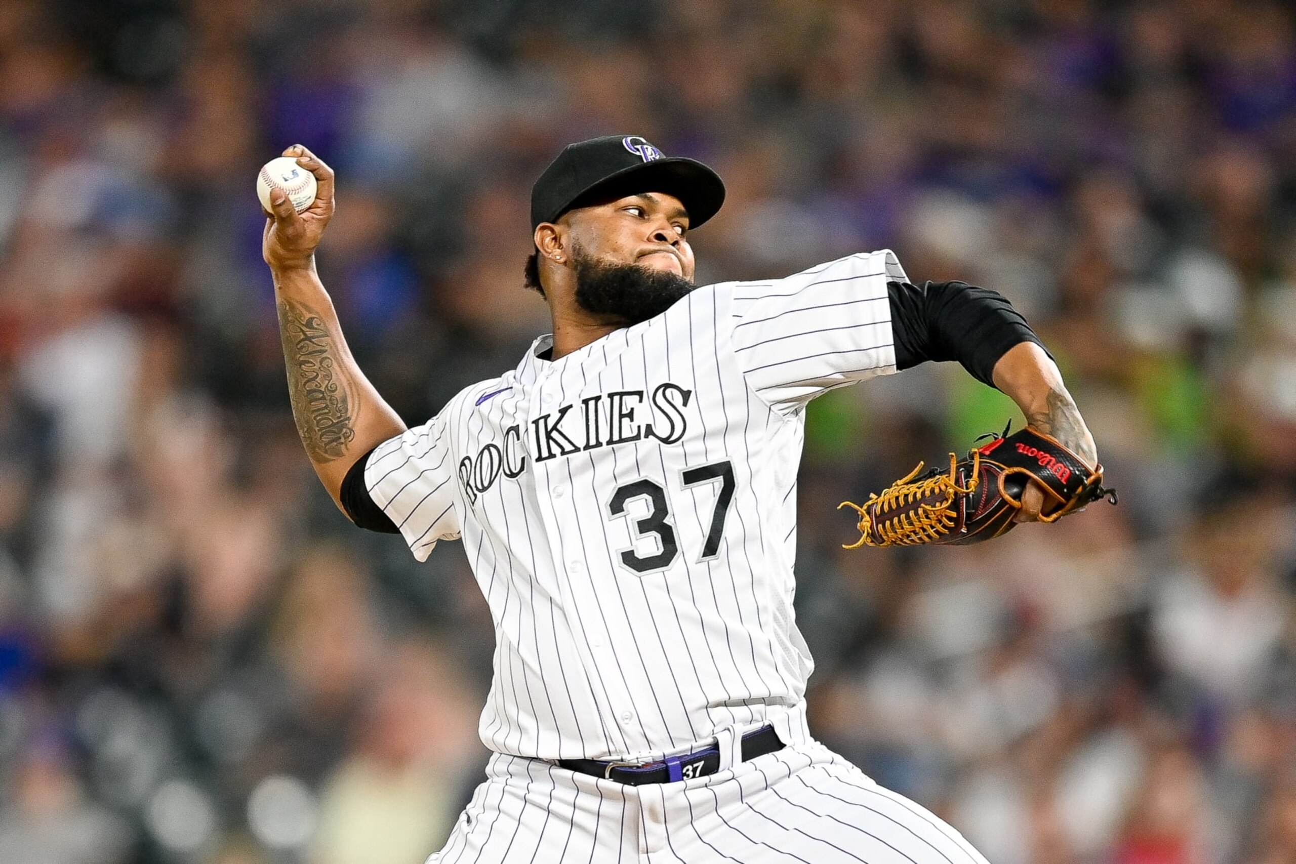 DENVER, CO - JUNE 14: Colorado Rockies relief pitcher Alex Colome (37) pitches during a game between the Cleveland Guardians and the Colorado Rockies at Coors Field on June 14, 2022 in Denver, Colorado. (Photo by Dustin Bradford/Icon Sportswire via Getty Images)