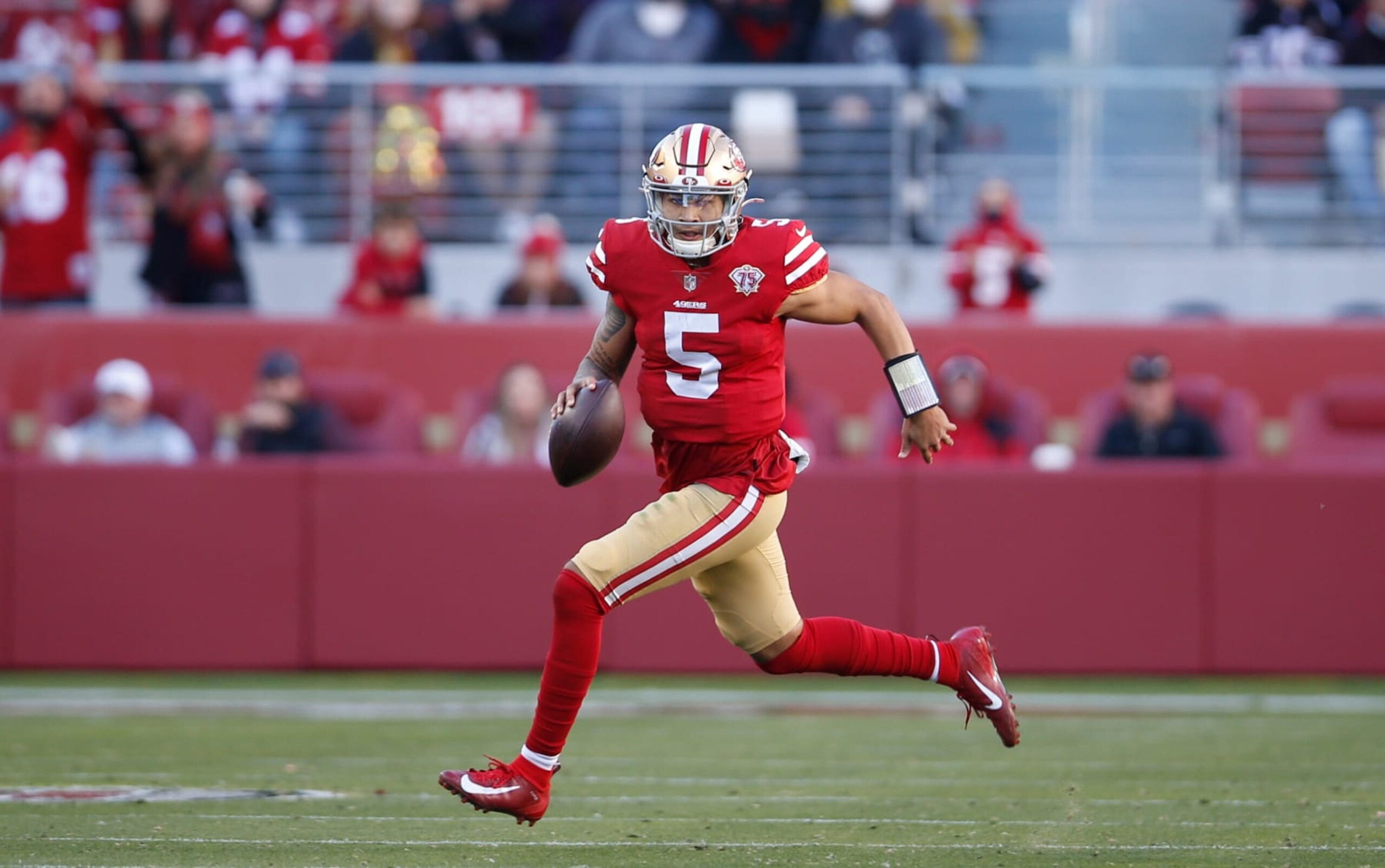 SANTA CLARA, CA - JANUARY 2: Trey Lance #5 of the San Francisco 49ers rushes during the game against the Houston Texans at Levi's Stadium on January 2, 2022 in Santa Clara, California. The 49ers defeated the Texans 23-7. (Photo by Michael Zagaris/San Francisco 49ers/Getty Images)