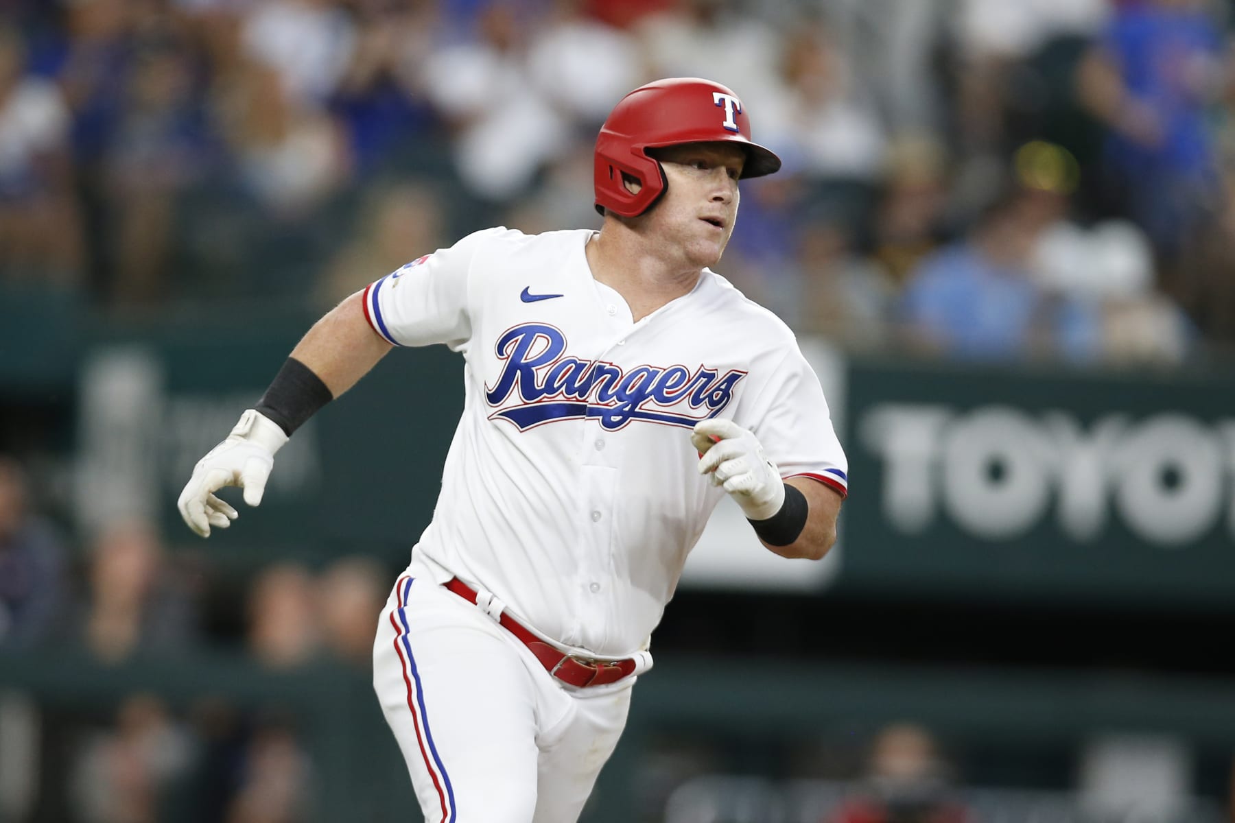 ARLINGTON, TEXAS - JULY 09: Kole Calhoun #56 of the Texas Rangers rounds the bases after hitting a three run home run against the Minnesota Twins in the second inning at Globe Life Field on July 09, 2022 in Arlington, Texas. (Photo by Tim Heitman/Getty Images)