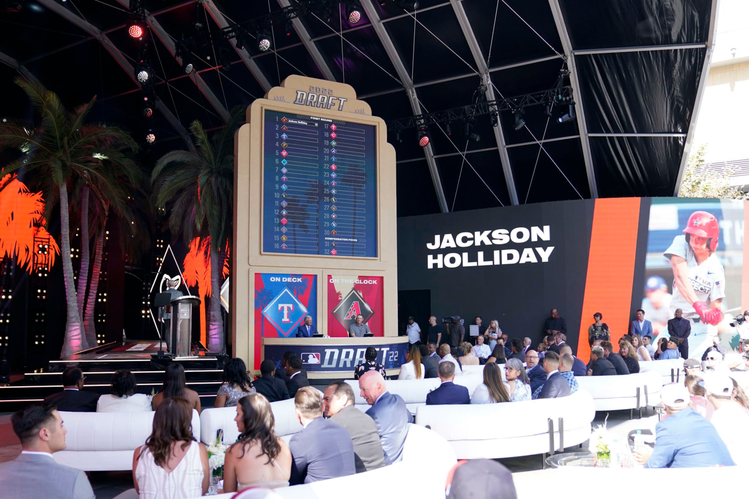 Jackson Holliday is announced as the first pick of the 2022 MLB baseball draft, by the Baltimore Orioles, Sunday, July 17, 2022, in Los Angeles. (AP Photo/Abbie Parr)