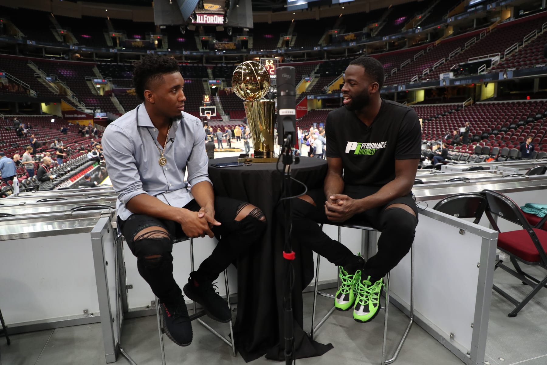 CLEVELAND, OH - JUNE 5: Donovan Mitchell of the Utah Jazz interviews Draymond Green of the Golden State Warriors during practice and media availability as part of the 2018 NBA Finals on June 5, 2018 at Quicken Loans Arena in Cleveland, Ohio. NOTE TO USER: User expressly acknowledges and agrees that, by downloading and or using this photograph, User is consenting to the terms and conditions of the Getty Images License Agreement. Mandatory Copyright Notice: Copyright 2018 NBAE (Photo by David Dow/NBAE via Getty Images) CLEVELAND, OH - JUNE 5: Donovan Mitchell of the Utah Jazz interviews Draymond Green of the Golden State Warriors during practice and media availability as part of the 2018 NBA Finals on June 5, 2018 at Quicken Loans Arena in Cleveland, Ohio. NOTE TO USER: User expressly acknowledges and agrees that, by downloading and or using this photograph, User is consenting to the terms and conditions of the Getty Images License Agreement. Mandatory Copyright Notice: Copyright 2018 NBAE (Photo by David Dow/NBAE via Getty Images)