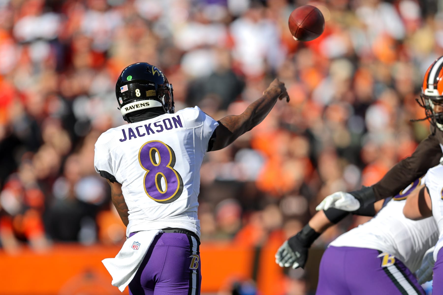CLEVELAND, OH - DECEMBER 12: Baltimore Ravens quarterback Lamar Jackson (8) throws a pass during the first quarter of the National Football League game between the Baltimore Ravens and Cleveland Browns on December 12, 2021, at FirstEnergy Stadium in Cleveland, OH. (Photo by Frank Jansky/Icon Sportswire via Getty Images)