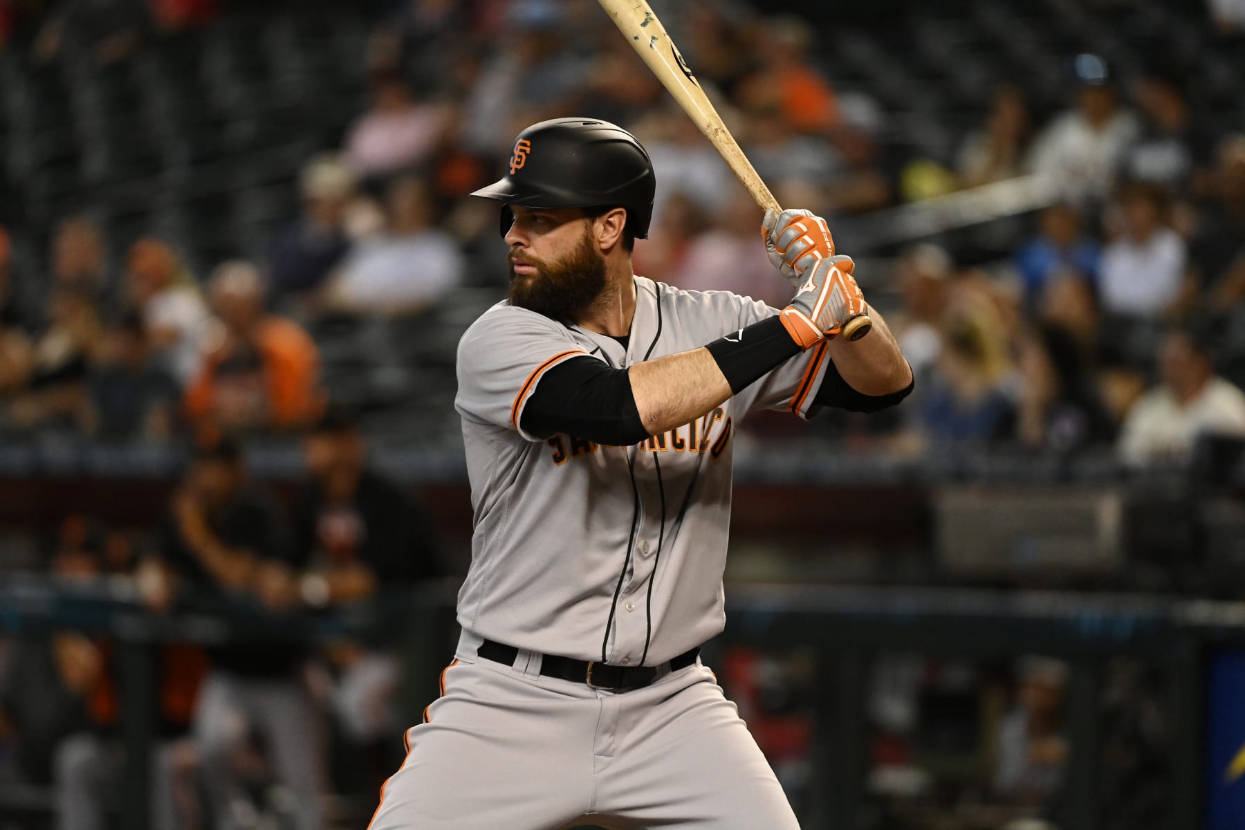 PHOENIX, ARIZONA - JULY 06: Brandon Belt #9 the San Francisco Giants gets ready in the batters box against the Arizona Diamondbacks at Chase Field on July 06, 2022 in Phoenix, Arizona. (Photo by Norm Hall/Getty Images)