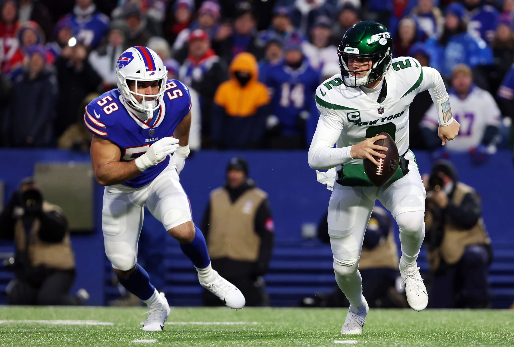 ORCHARD PARK, NEW YORK - JANUARY 09: Zach Wilson #2 of the New York Jets looks to pass against the Buffalo Bills during the first half at Highmark Stadium on January 09, 2022 in Orchard Park, New York. (Photo by Timothy T Ludwig/Getty Images)