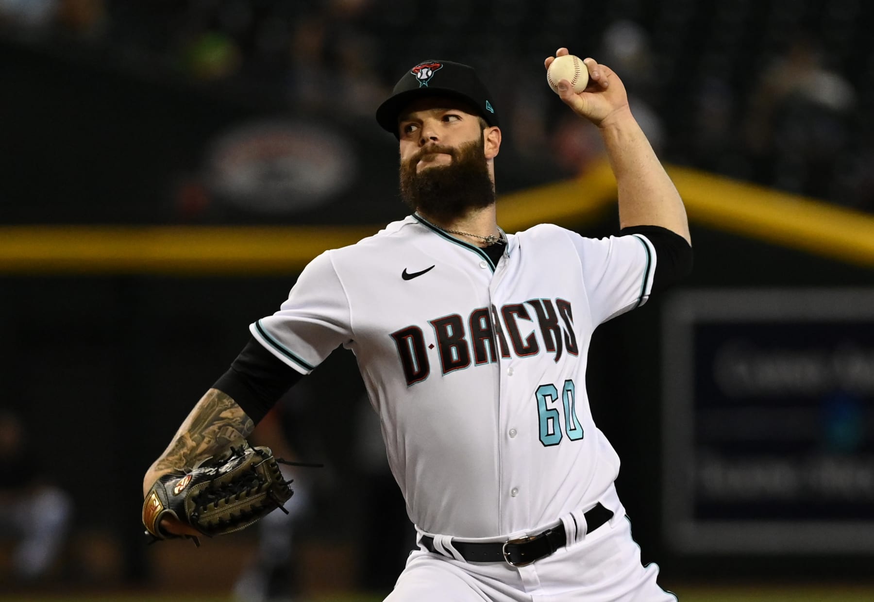PHOENIX, ARIZONA - JULY 07: Dallas Keuchel #60 of the Arizona Diamondbacks delivers a first inning pitch against the Colorado Rockies at Chase Field on July 07, 2022 in Phoenix, Arizona. (Photo by Norm Hall/Getty Images)