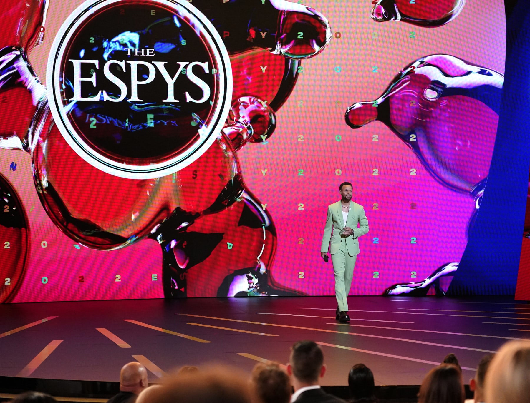 Host Stephen Curry, NBA player with the Golden State Warriors walks onstage at the ESPY Awards on Wednesday, July 20, 2022, at the Dolby Theatre in Los Angeles. (AP Photo/Mark Terrill)