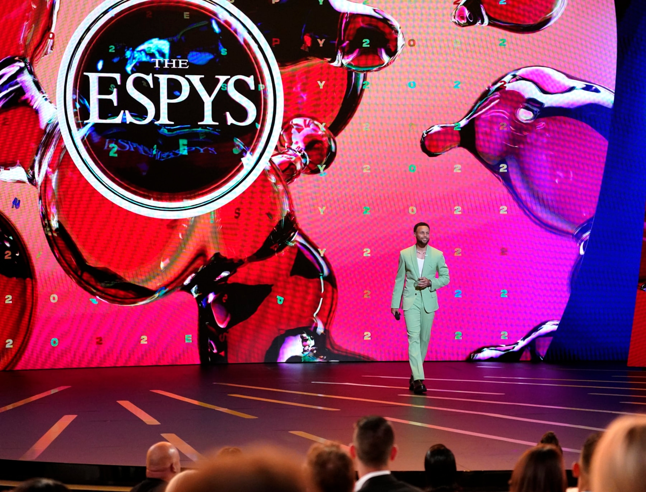 Host Stephen Curry, NBA player with the Golden State Warriors walks onstage at the ESPY Awards on Wednesday, July 20, 2022, at the Dolby Theatre in Los Angeles. (AP Photo/Mark Terrill)