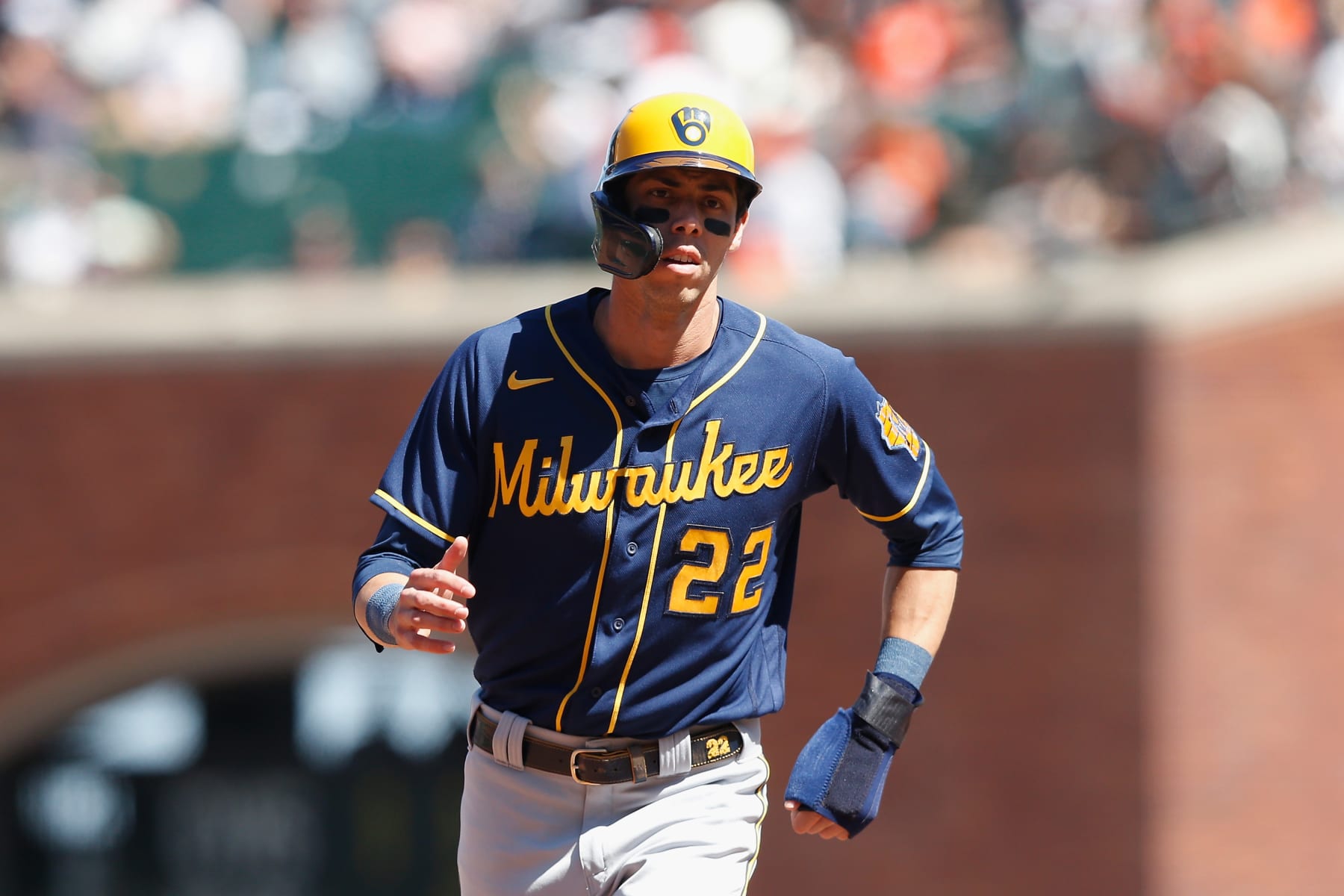 SAN FRANCISCO, CALIFORNIA - JULY 17: Christian Yelich #22 of the Milwaukee Brewers rounds the bases to score on a two-run home run by Rowdy Tellez #11 in the top of the eighth inning against the San Francisco Giants at Oracle Park on July 17, 2022 in San Francisco, California. (Photo by Lachlan Cunningham/Getty Images)