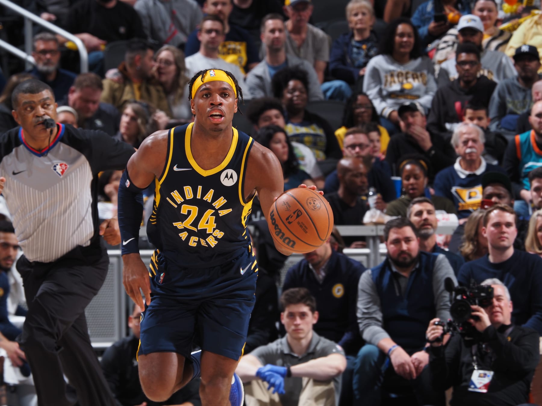 INDIANAPOLIS, IN - MARCH 30: Buddy Hield #24 of the Indiana Pacers handles the ball during the game against the Denver Nuggets on March 30, 2022 at Gainbridge Fieldhouse in Indianapolis, Indiana. NOTE TO USER: User expressly acknowledges and agrees that, by downloading and or using this Photograph, user is consenting to the terms and conditions of the Getty Images License Agreement. Mandatory Copyright Notice: Copyright 2022 NBAE (Photo by Ron Hoskins/NBAE via Getty Images)