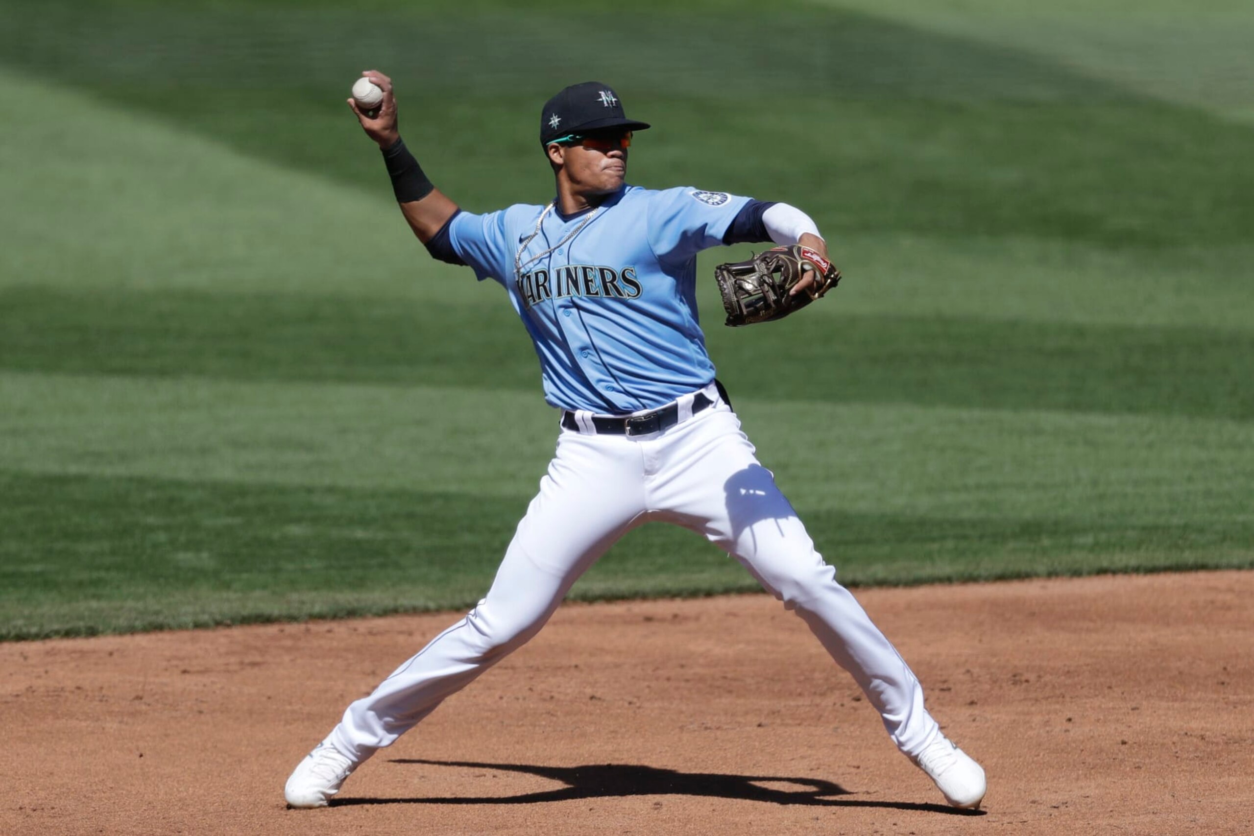 Seattle Mariners shortstop Noelvi Marte throws to first during an intrasquad baseball game Tuesday, July 14, 2020, in Seattle. (AP Photo/Elaine Thompson)