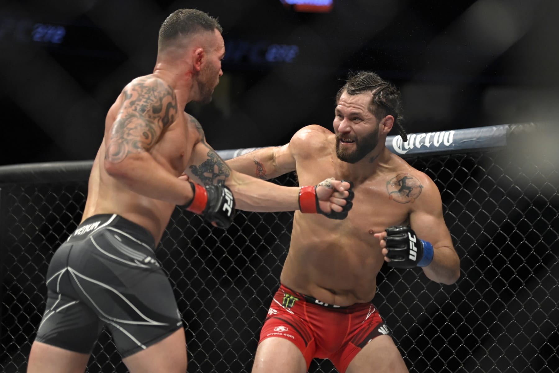 LAS VEGAS, NEVADA - MARCH 05: Colby Covington (L) and Jorge Masvidal battle in their welterweight fight during UFC 272 at T-Mobile Arena on March 05, 2022 in Las Vegas, Nevada. (Photo by David Becker/Getty Images)