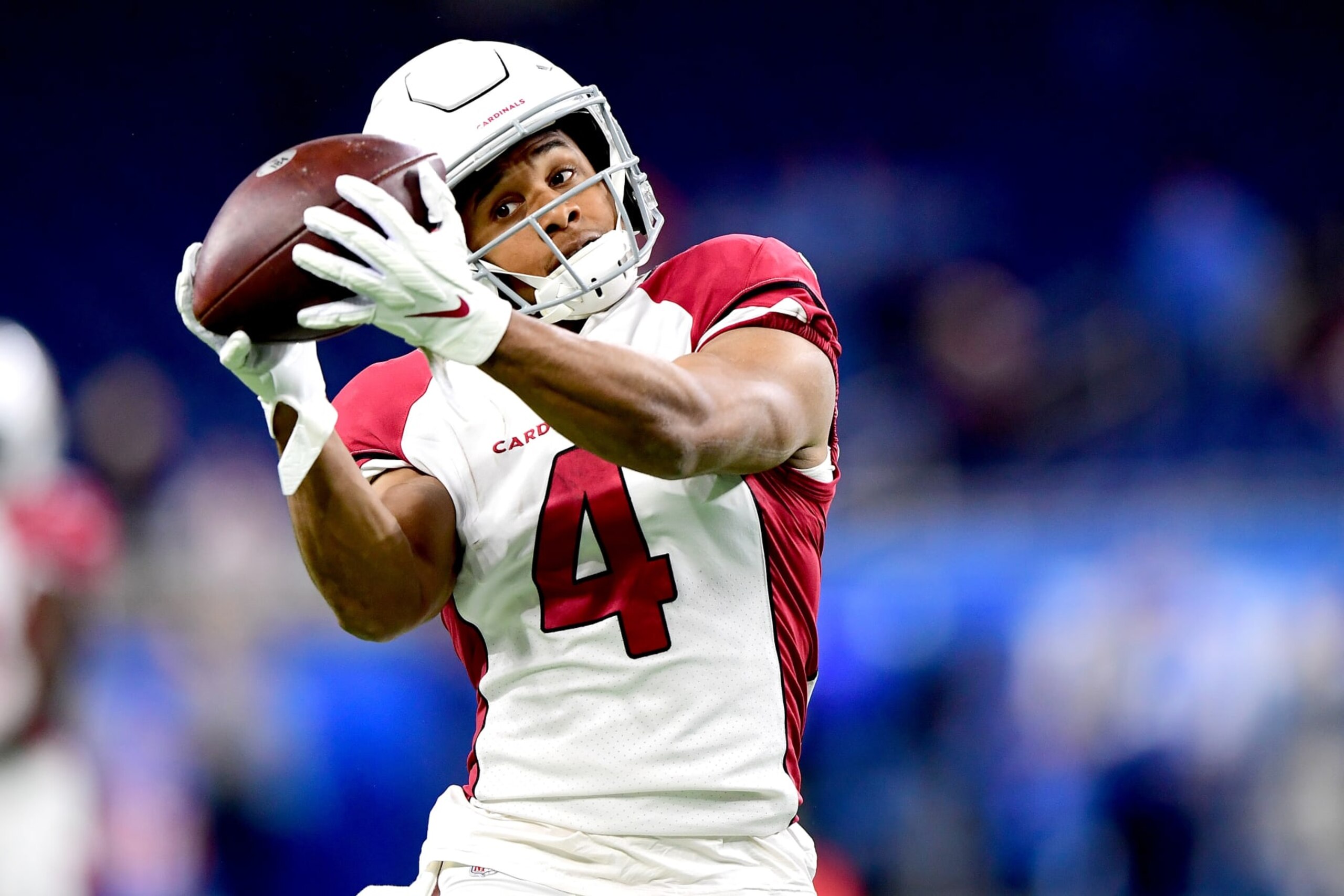 DETROIT, MICHIGAN - DECEMBER 19: Rondale Moore #4 of the Arizona Cardinals catches a ball during warm-up before the game against the Detroit Lions at Ford Field on December 19, 2021 in Detroit, Michigan. (Photo by Emilee Chinn/Getty Images)