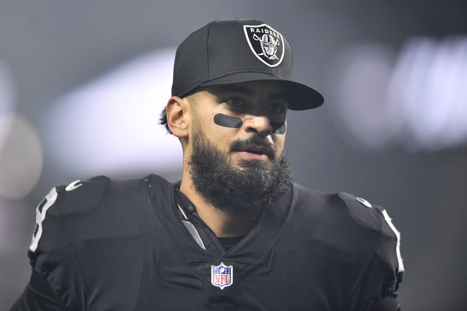 LAS VEGAS, NEVADA - JANUARY 09:  Quarterback Marcus Mariota #8 of the Las Vegas Raiders runs off the field after the team's 35-32 overtime victory over the Los Angeles Chargers at Allegiant Stadium on January 09, 2022 in Las Vegas, Nevada. (Photo by Chris Unger/Getty Images)