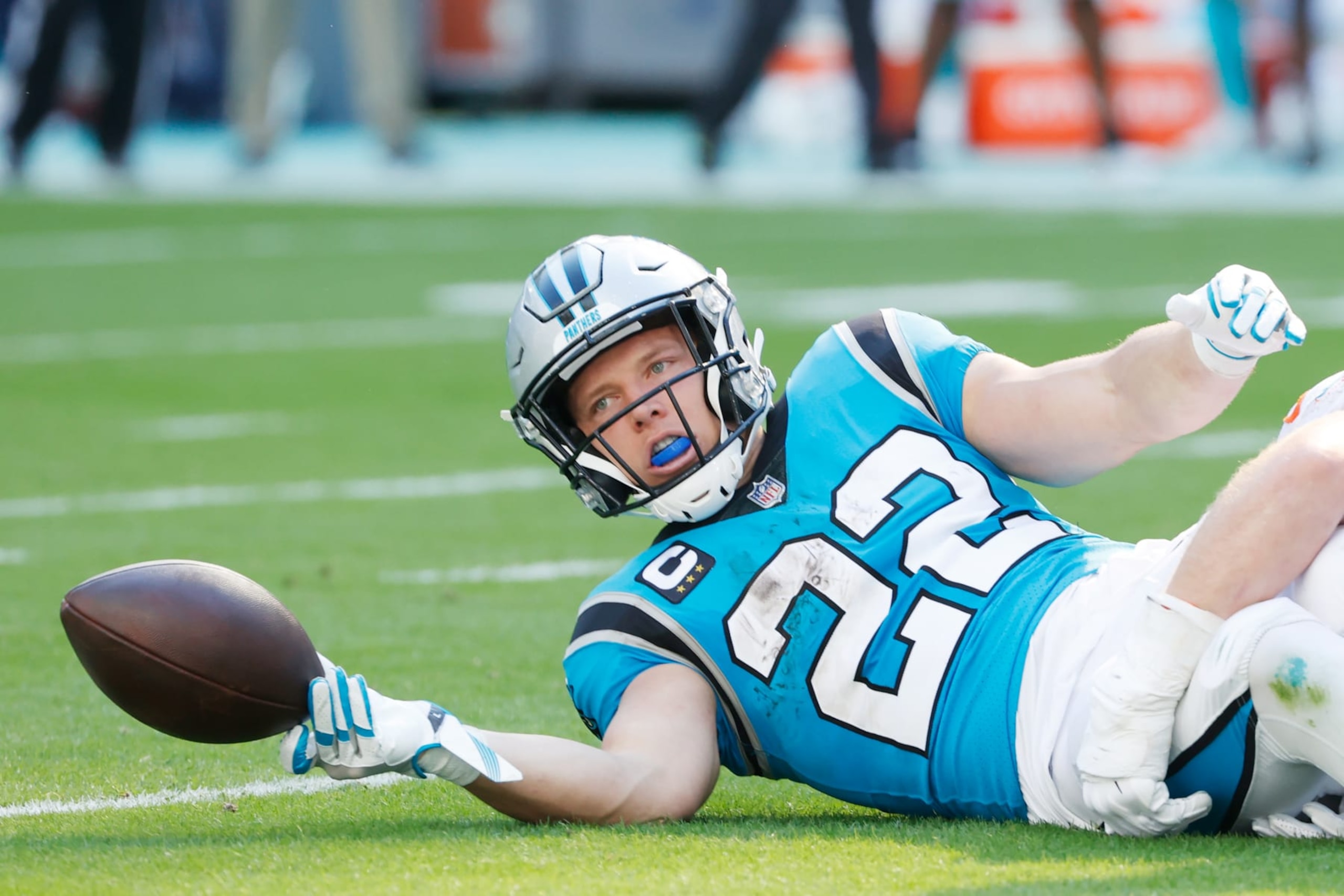 MIAMI GARDENS, FLORIDA - NOVEMBER 28: Christian McCaffrey #22 of the Carolina Panthers during their game against the Miami Dolphins at Hard Rock Stadium on November 28, 2021 in Miami Gardens, Florida. (Photo by Cliff Hawkins/Getty Images)
