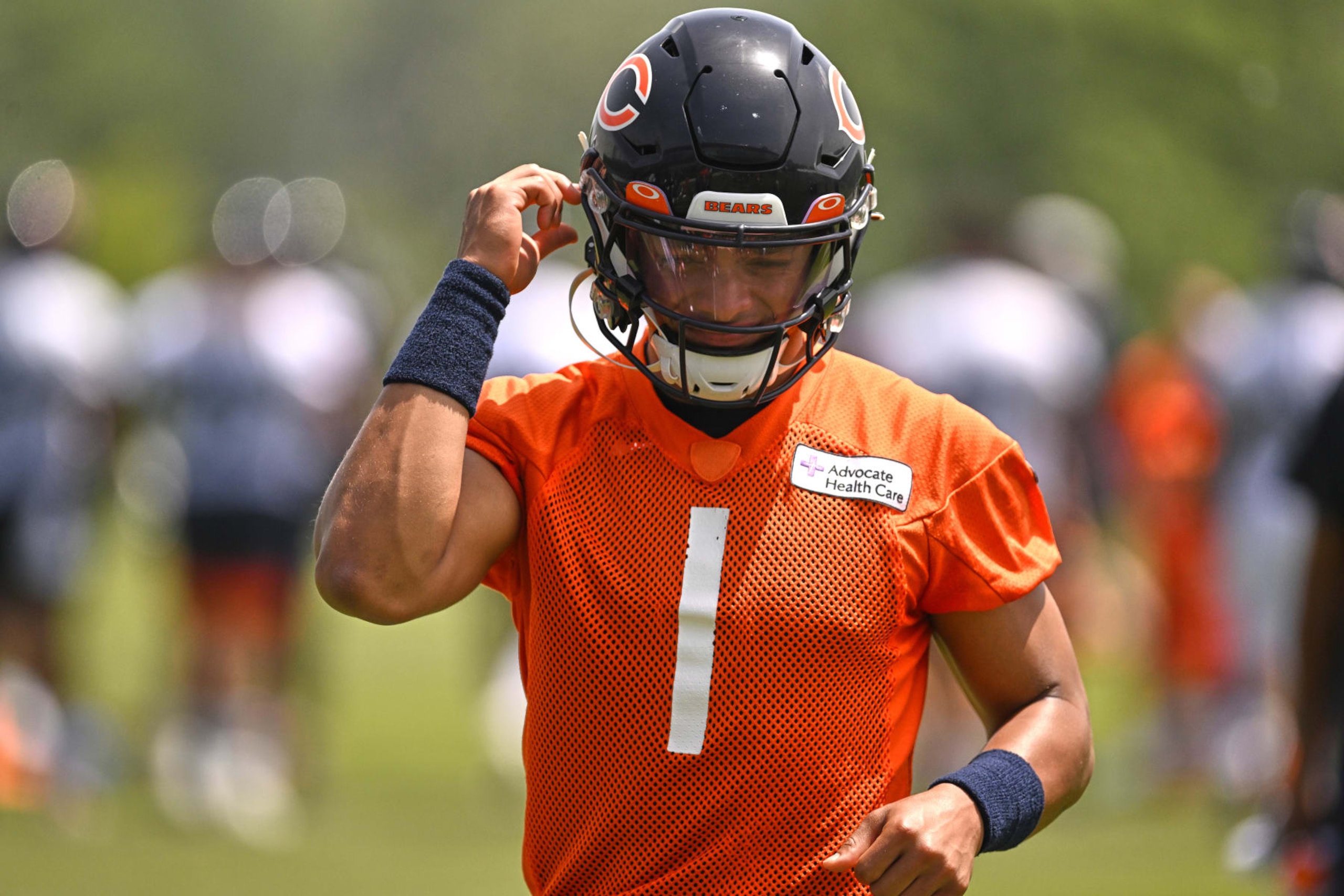 LAKE FOREST, IL - JUNE 15: Chicago Bears quarterback Justin Fields (1) adjusts his helmet during the the Chicago Bears Minicamp on June 15, 2022 at Halas Hall in Lake Forest, IL. (Photo by Robin Alam/Icon Sportswire via Getty Images)